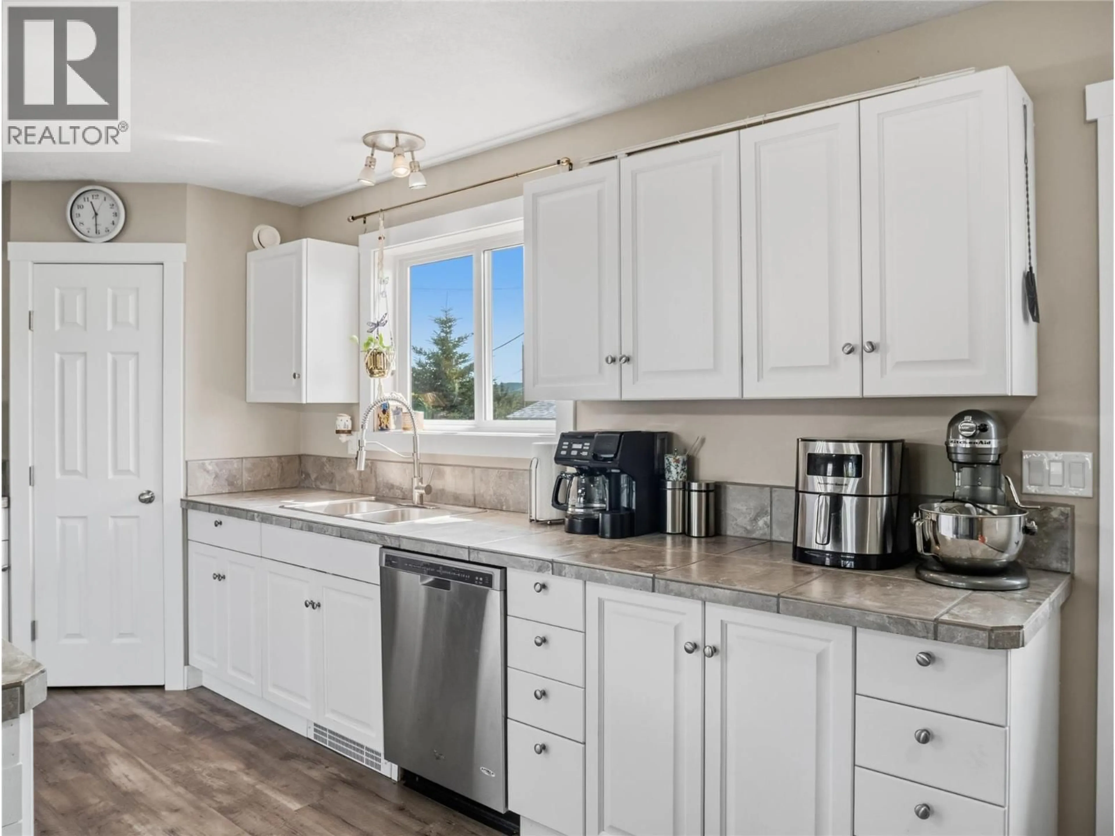 Open concept kitchen, ceramic/tile floor for 4609 RAILWAY AVENUE, Pouce Coupe British Columbia V0C2C0