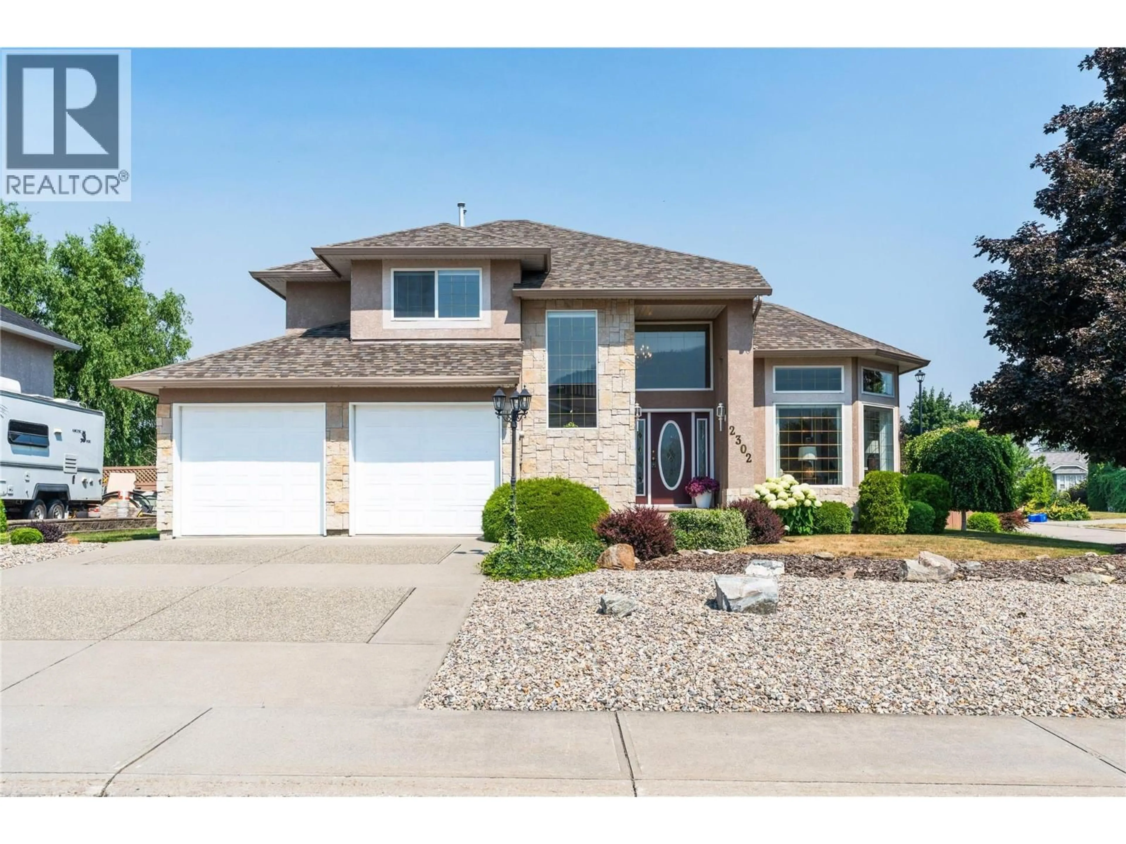 Home with brick exterior material, street for 2302 MAUNDRELL AVENUE, Armstrong British Columbia V4Y0C2