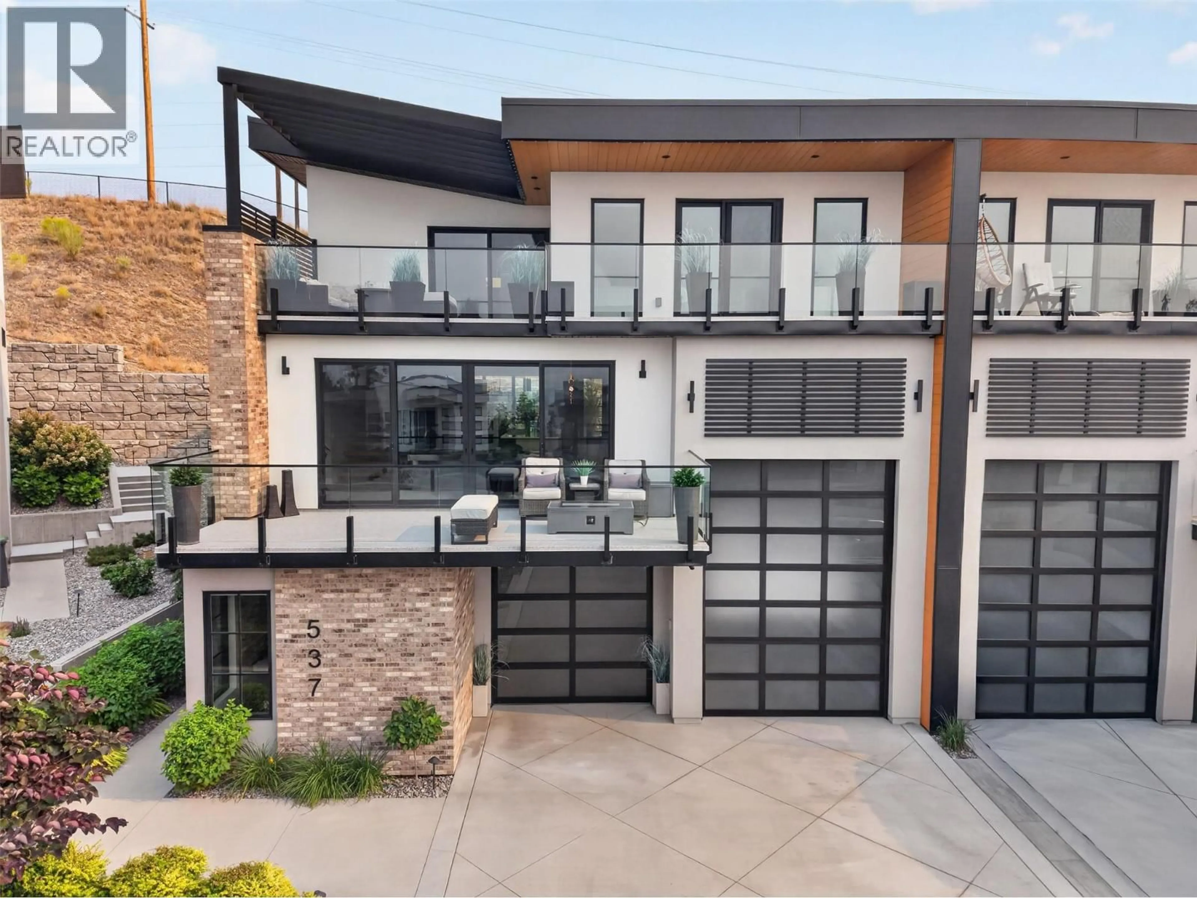 Home with brick exterior material, street for 537 HAWES COURT, Kelowna British Columbia V1W5C5