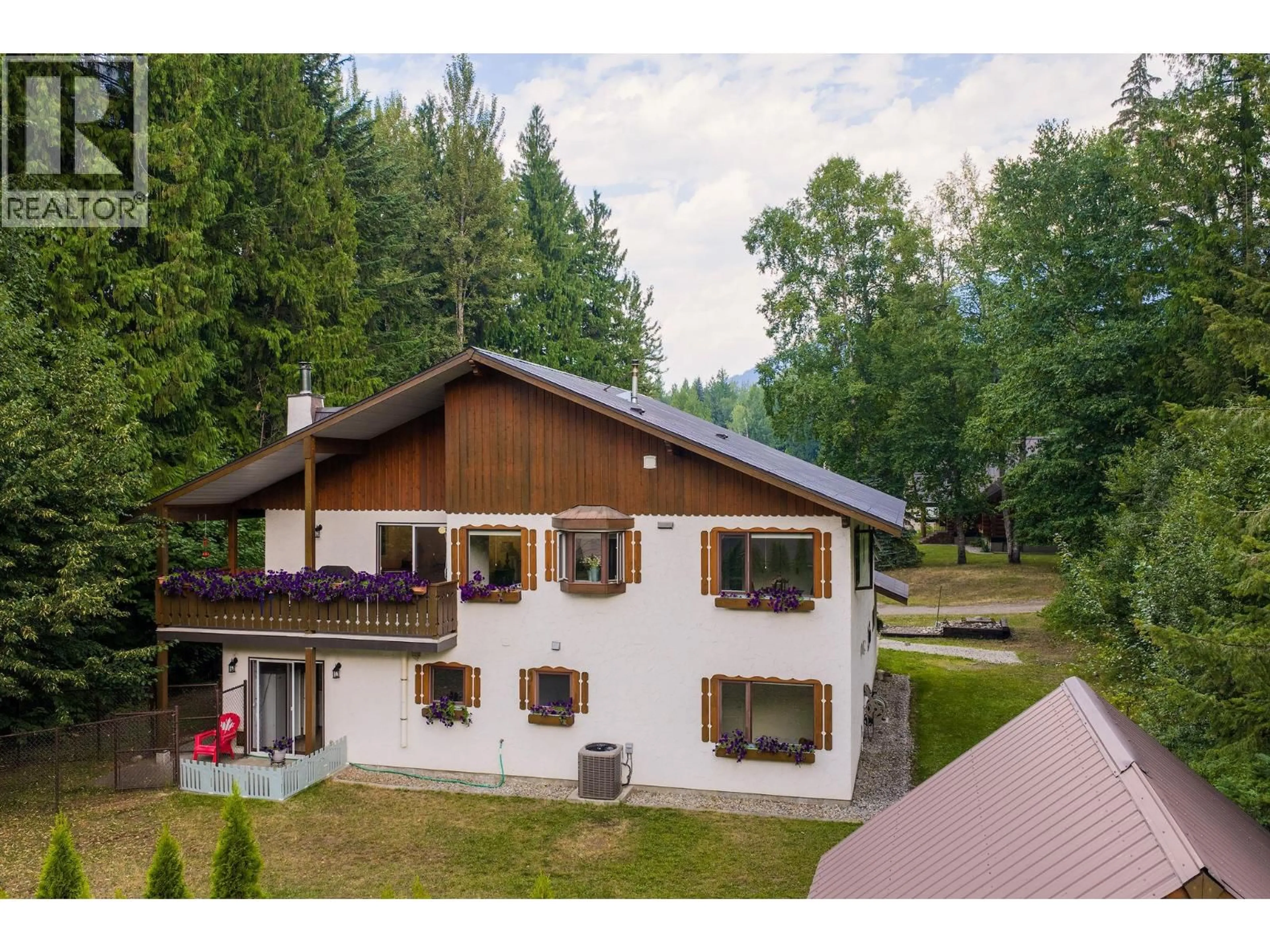 A pic from outside/outdoor area/front of a property/back of a property/a pic from drone, mountain view for 1587 PRATICO ROAD, Revelstoke British Columbia V0E2S1