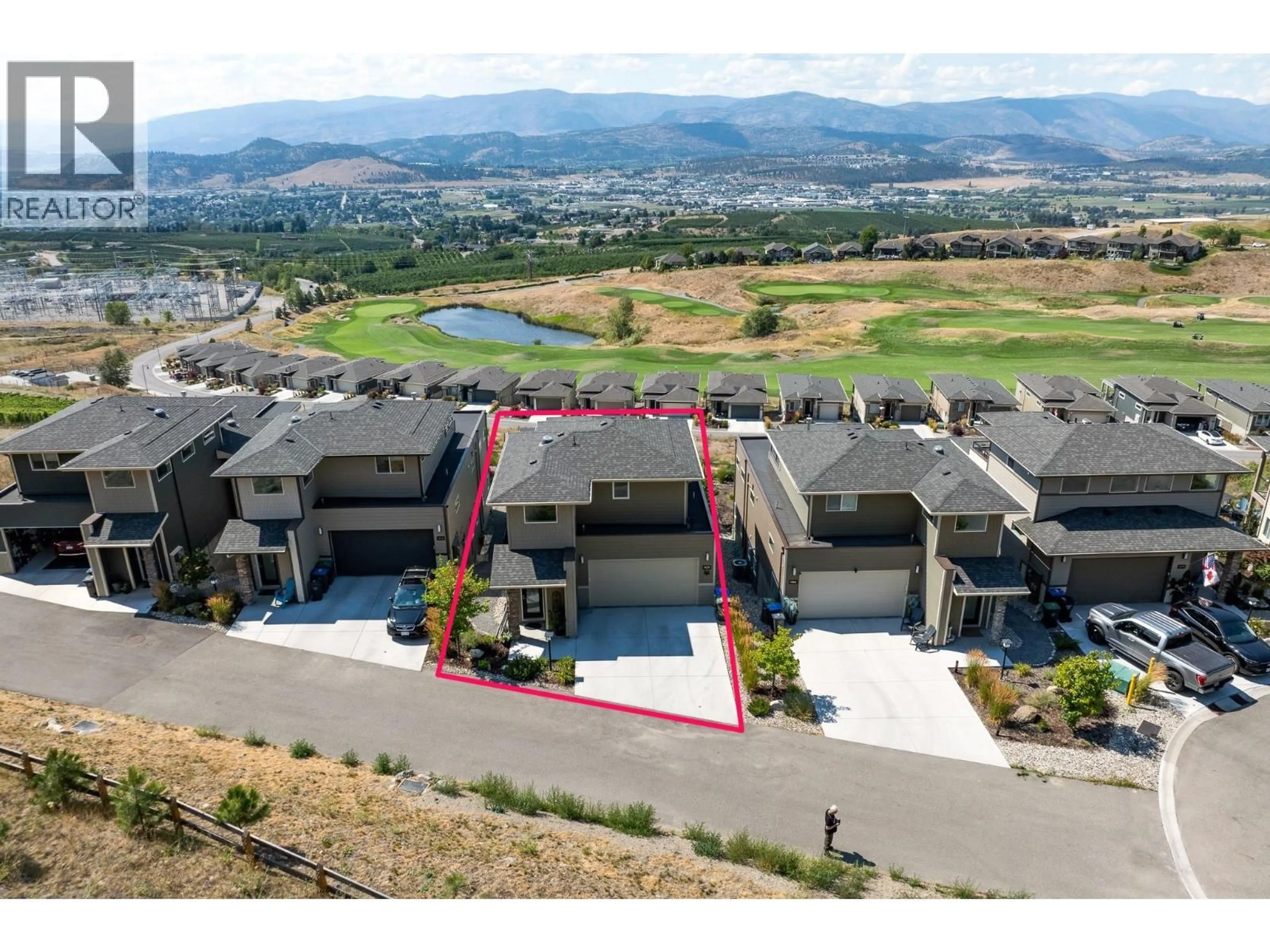 A pic from outside/outdoor area/front of a property/back of a property/a pic from drone, mountain view for 1458 SUMMER CRESCENT, Kelowna British Columbia V1P1T8