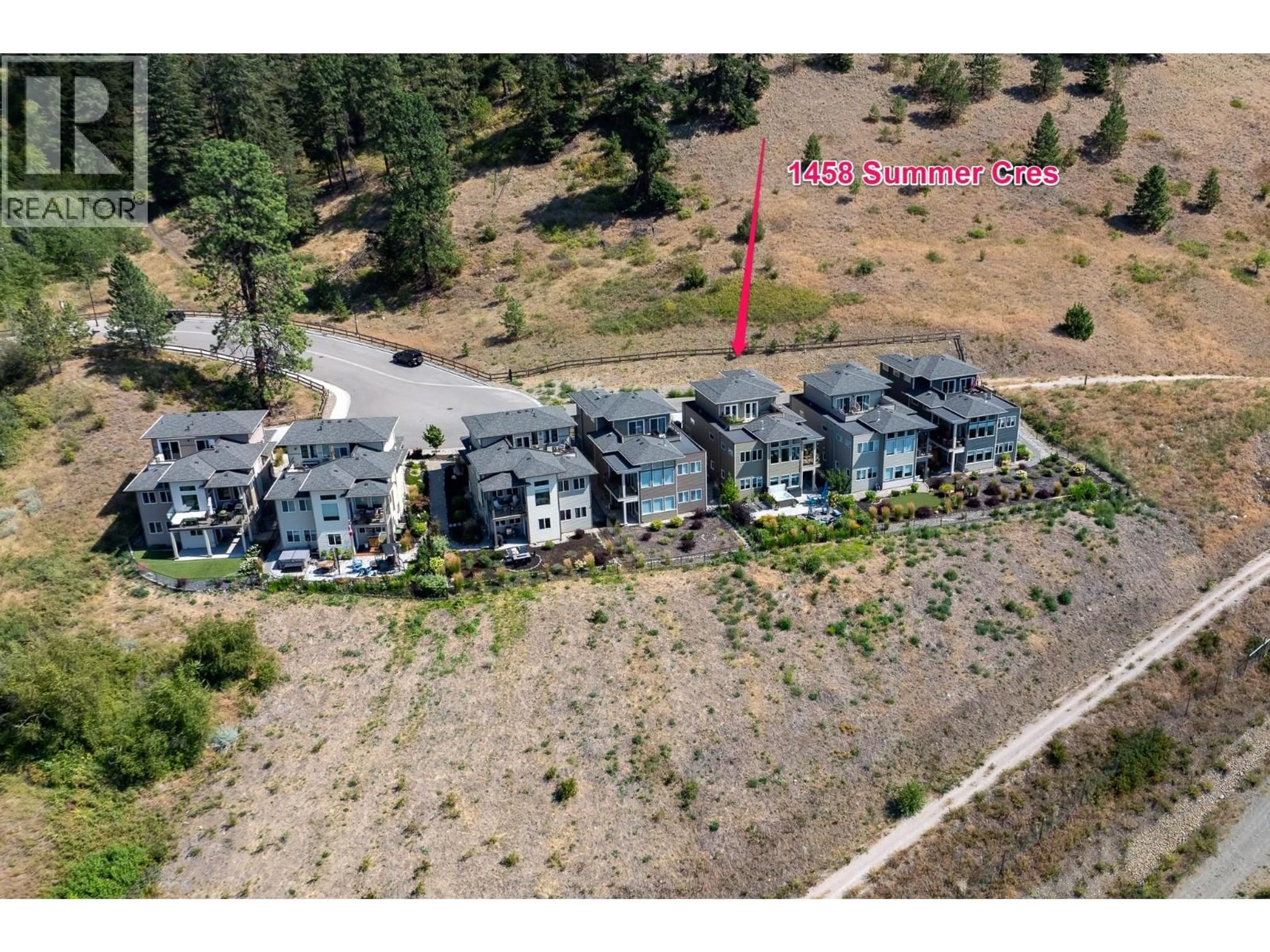 A pic from outside/outdoor area/front of a property/back of a property/a pic from drone, mountain view for 1458 SUMMER CRESCENT, Kelowna British Columbia V1P1T8