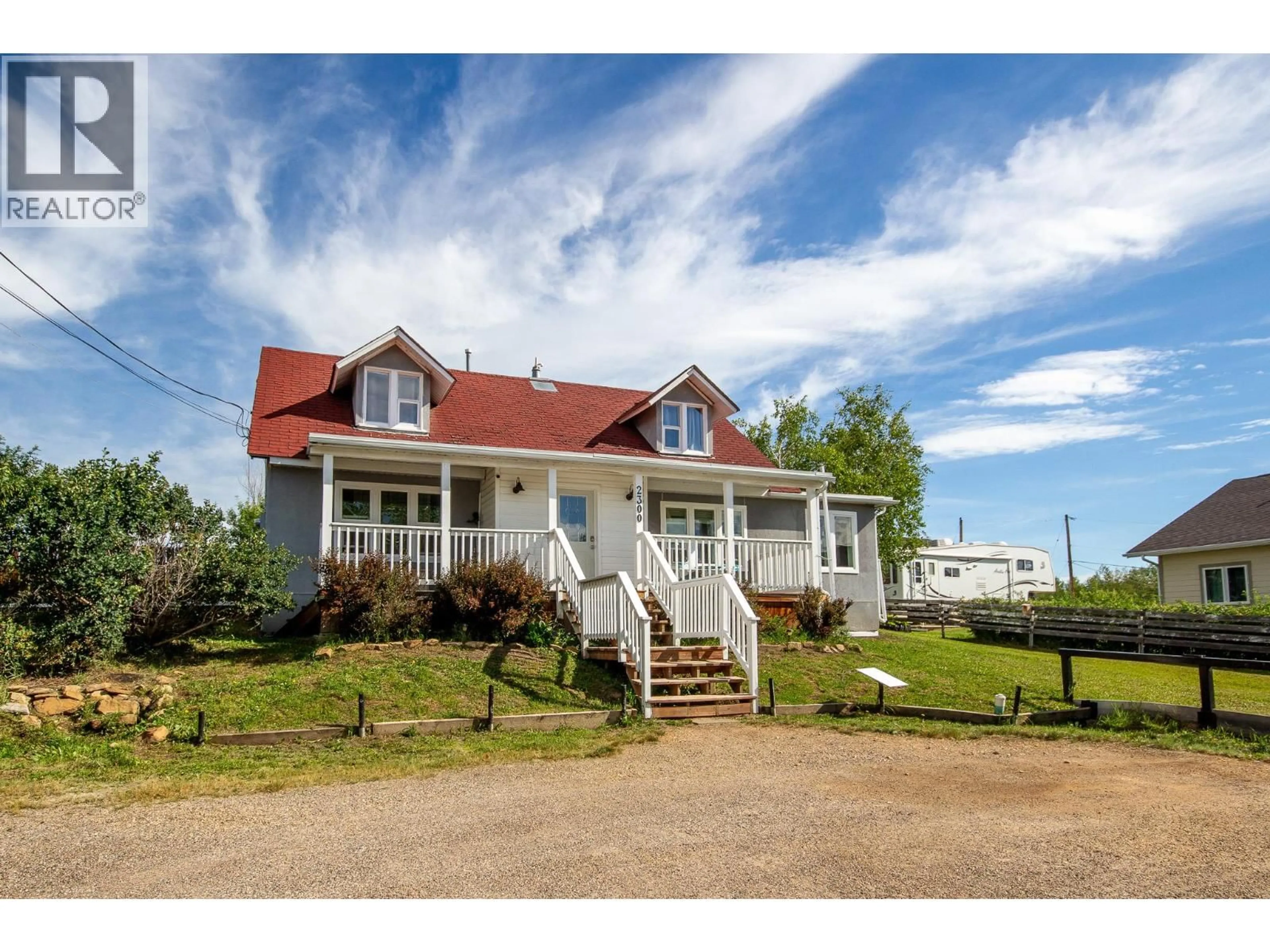 A pic from outside/outdoor area/front of a property/back of a property/a pic from drone, street for 2300 CHILTON OTHER, Dawson Creek British Columbia V1G0B9