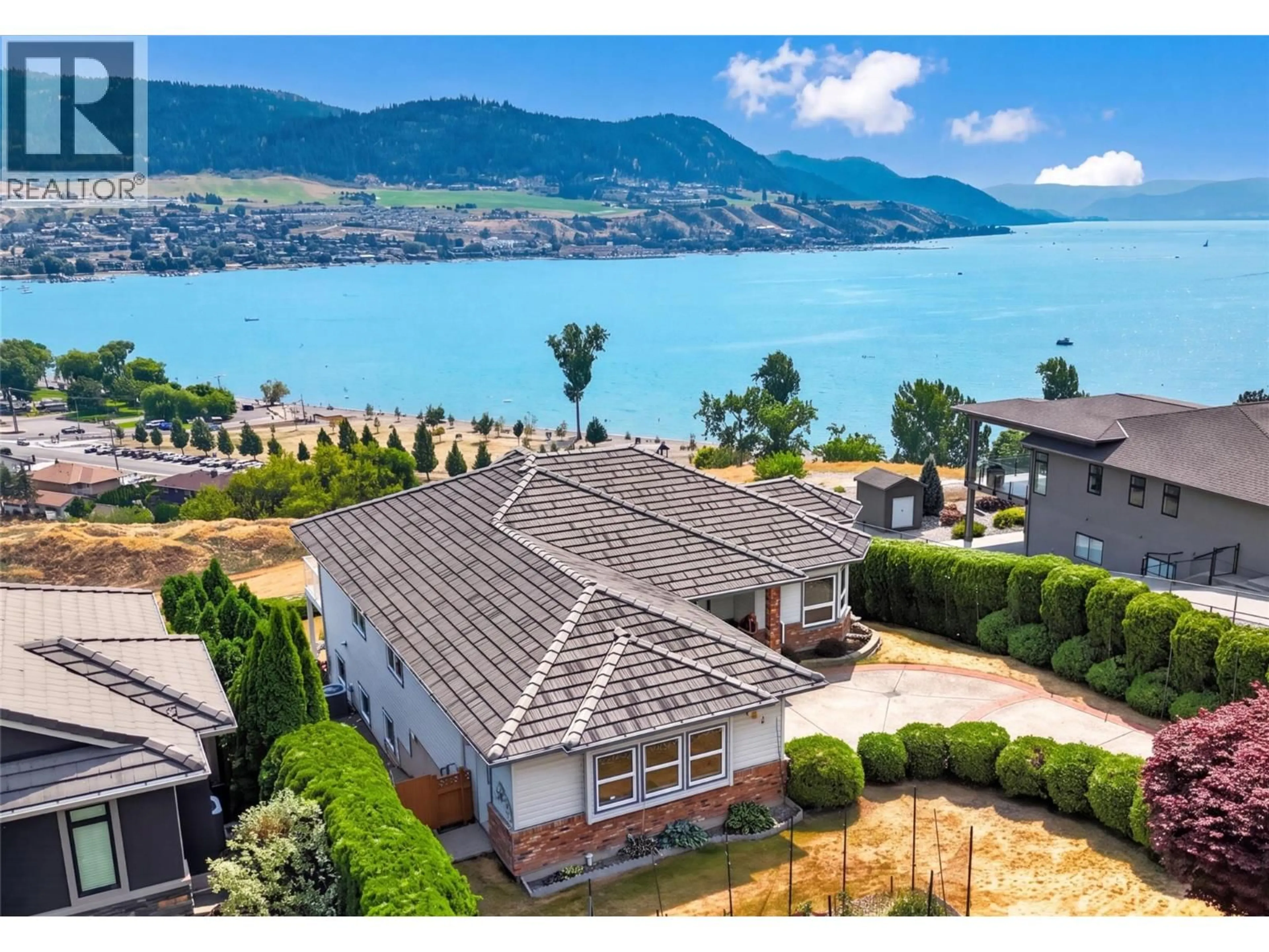 A pic from outside/outdoor area/front of a property/back of a property/a pic from drone, water/lake/river/ocean view for 7083 JASPER DRIVE, Vernon British Columbia V1H1P2