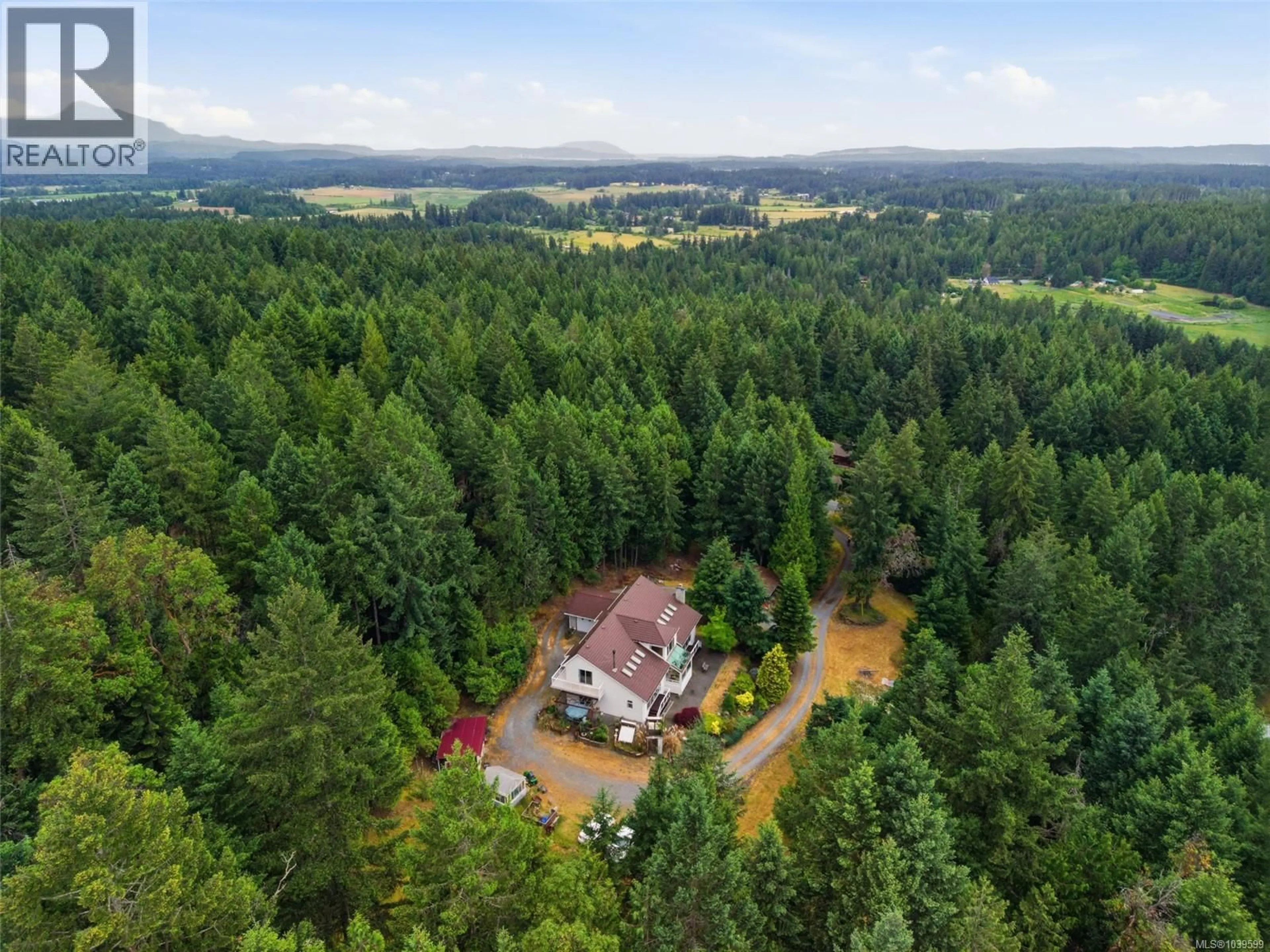 A pic from outside/outdoor area/front of a property/back of a property/a pic from drone, forest/trees view for 4782 AHO ROAD, Ladysmith British Columbia V9G1G8