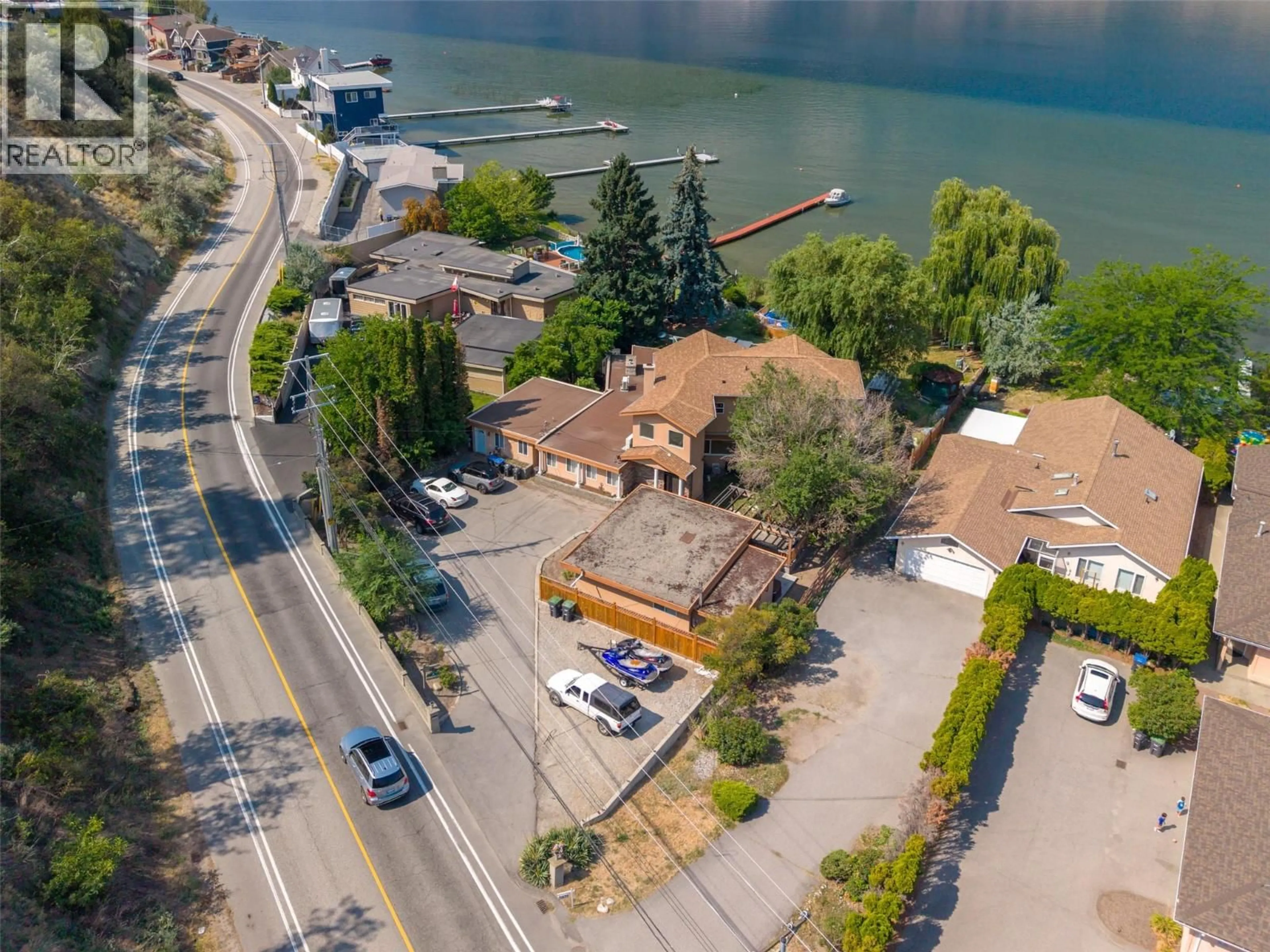 A pic from outside/outdoor area/front of a property/back of a property/a pic from drone, water/lake/river/ocean view for 3935 LAKESIDE ROAD, Penticton British Columbia V2A8W1