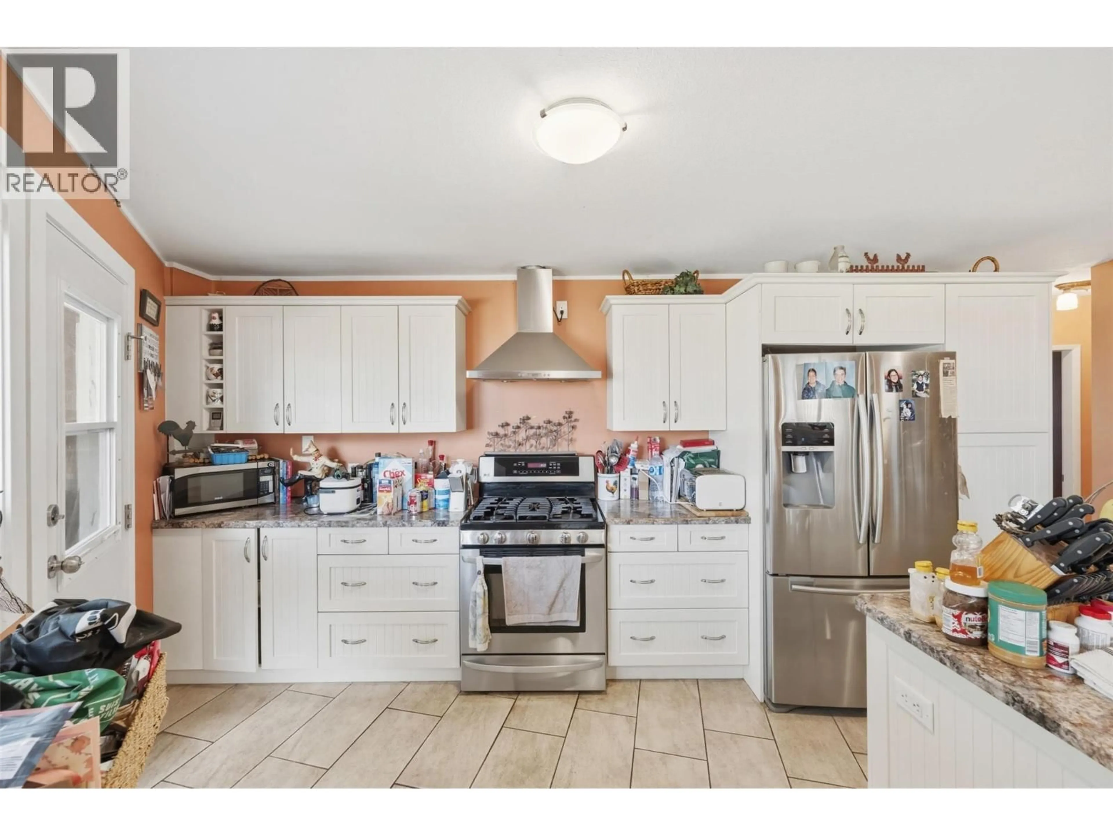 Open concept kitchen, ceramic/tile floor for 3935 LAKESIDE ROAD, Penticton British Columbia V2A8W1