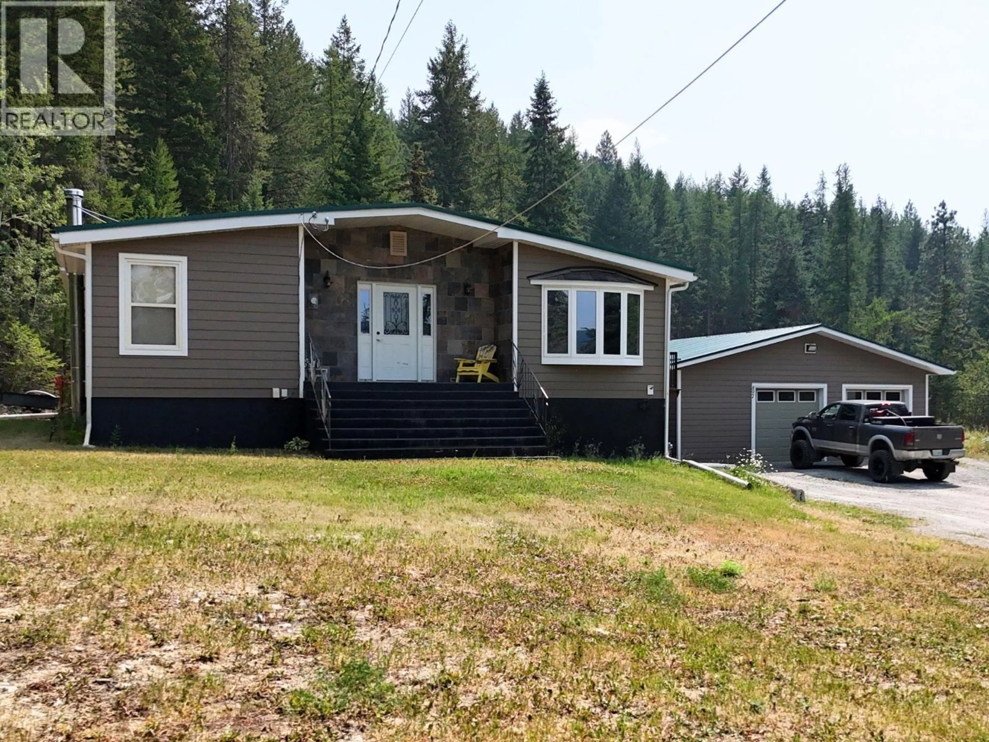Home with vinyl exterior material, unknown for 897 SILVER CREEK ROAD, Cranbrook British Columbia V1C6X7