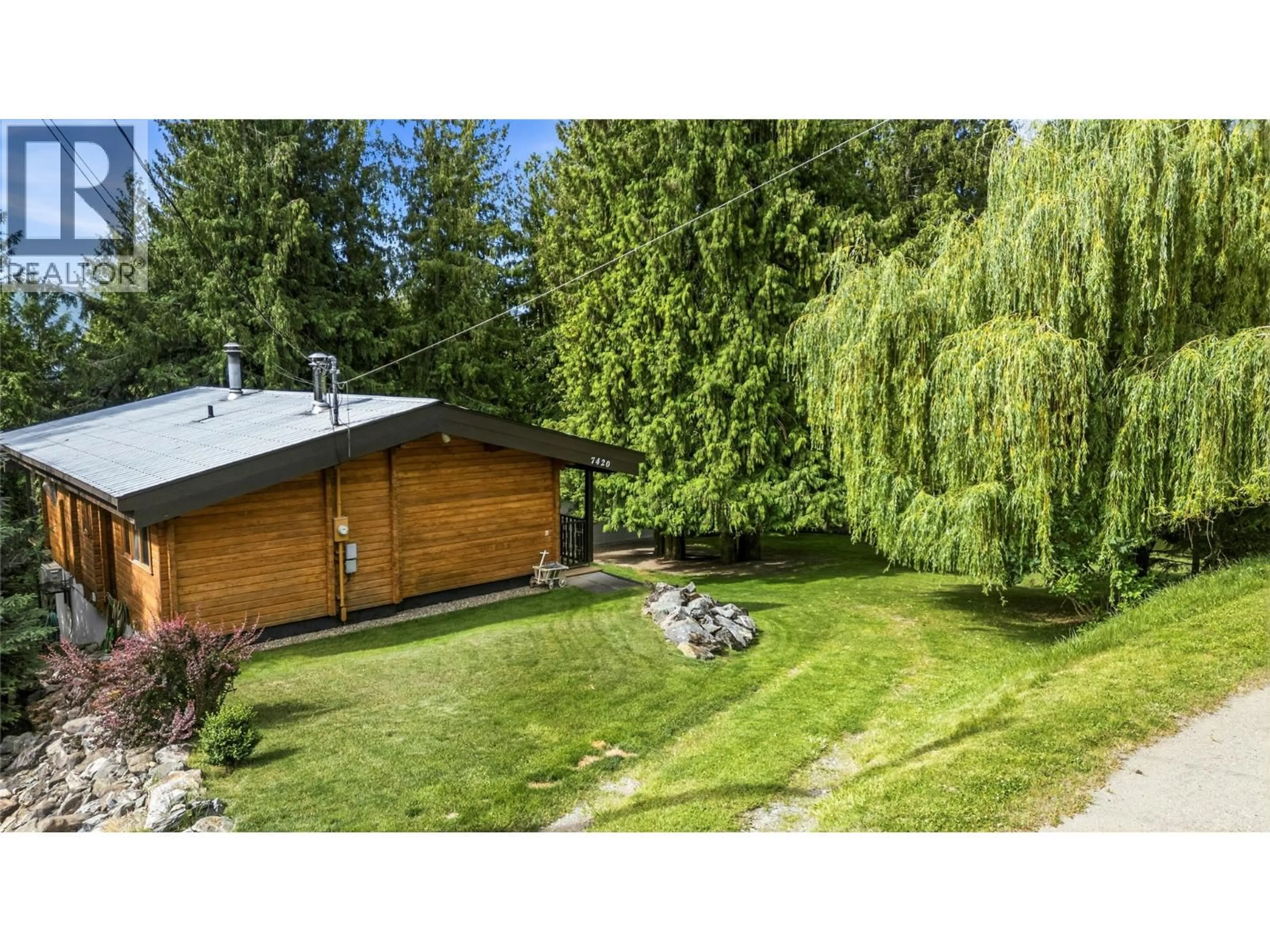 A pic from outside/outdoor area/front of a property/back of a property/a pic from drone, forest/trees view for 7420 STAMPEDE TRAIL, Anglemont British Columbia V0E1M8