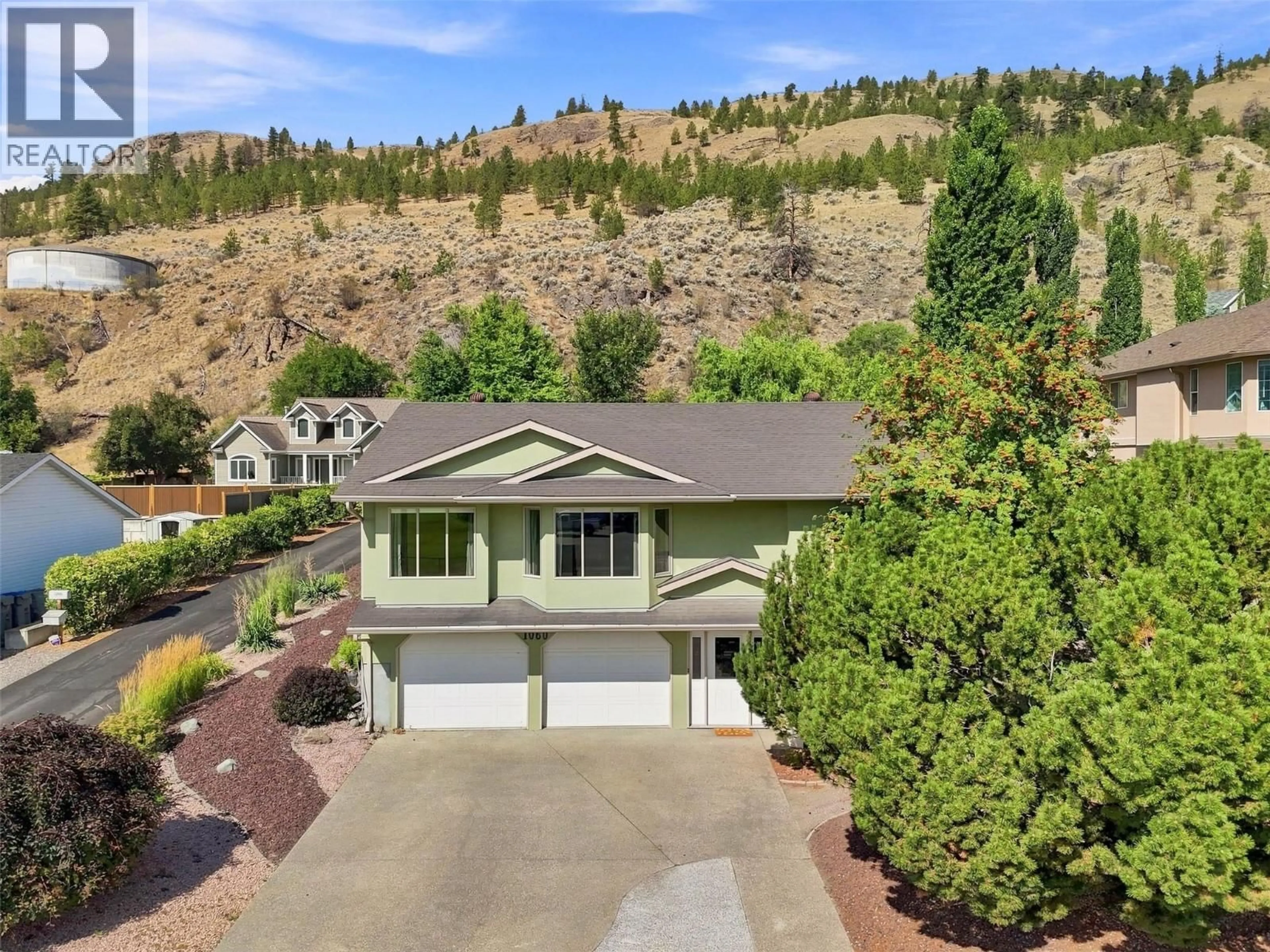 A pic from outside/outdoor area/front of a property/back of a property/a pic from drone, mountain view for 1060 PINE SPRINGS ROAD, Kamloops British Columbia V2B8A8