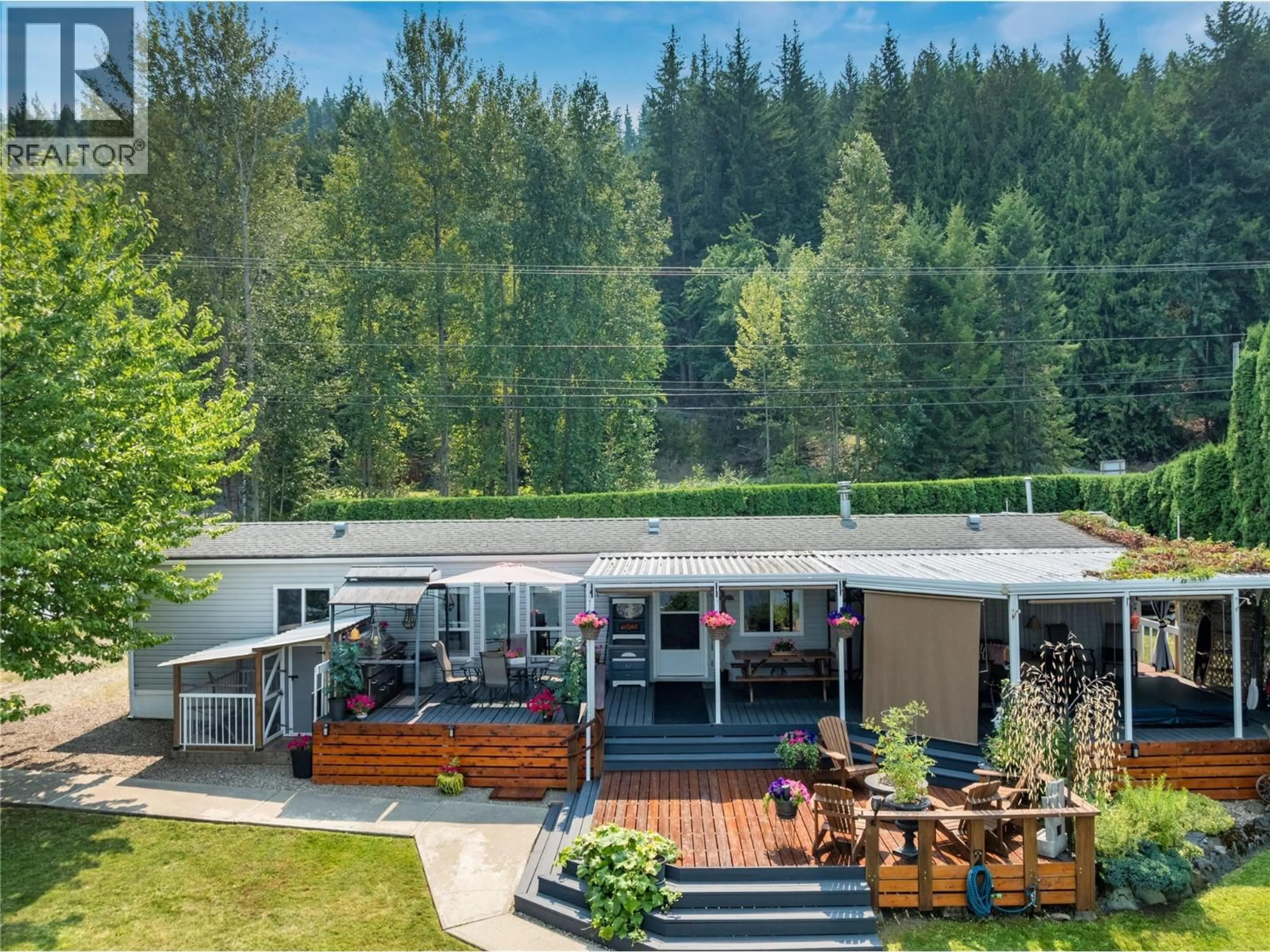 A pic from outside/outdoor area/front of a property/back of a property/a pic from drone, unknown for 3565 EAGLE BAY ROAD, Eagle Bay British Columbia V0E1T0