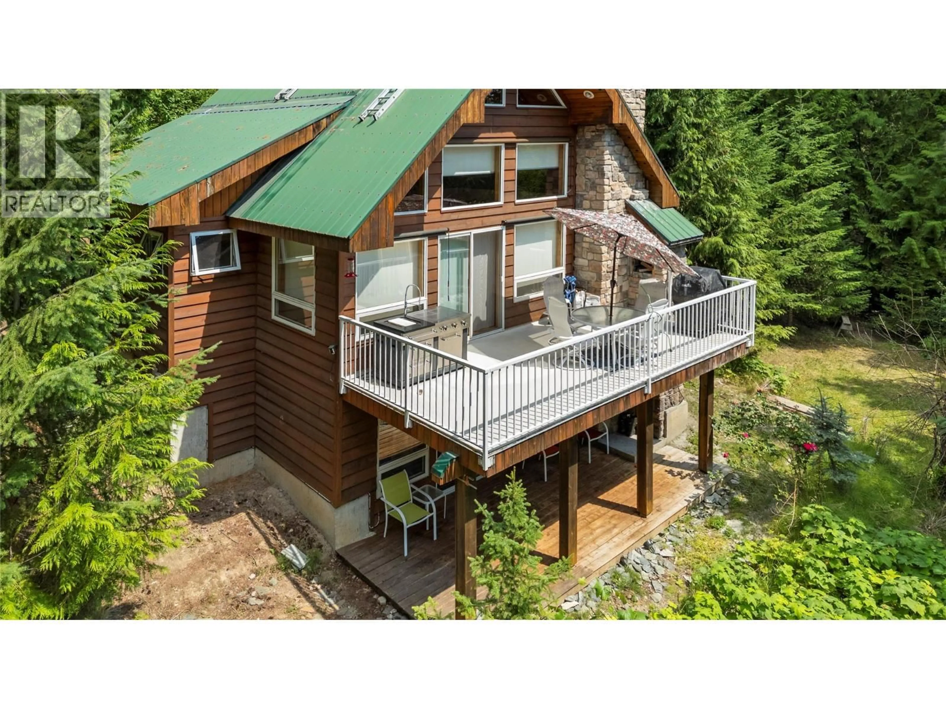 A pic from outside/outdoor area/front of a property/back of a property/a pic from drone, unknown for 7621 HUDSON ROAD, Anglemont British Columbia V0E1M8