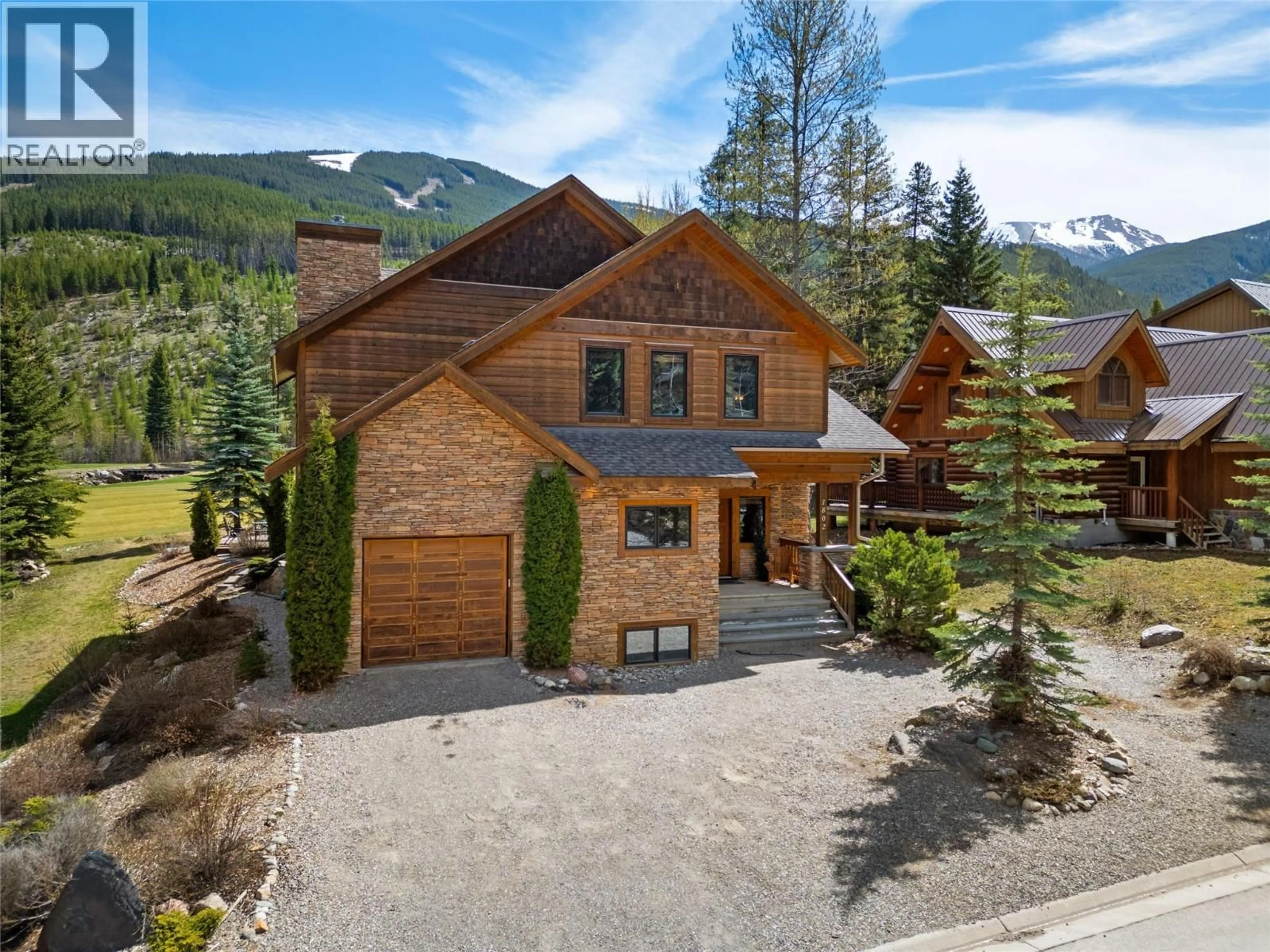 A pic from outside/outdoor area/front of a property/back of a property/a pic from drone, mountain view for 1802 GREYWOLF DRIVE, Panorama British Columbia V0A1T0