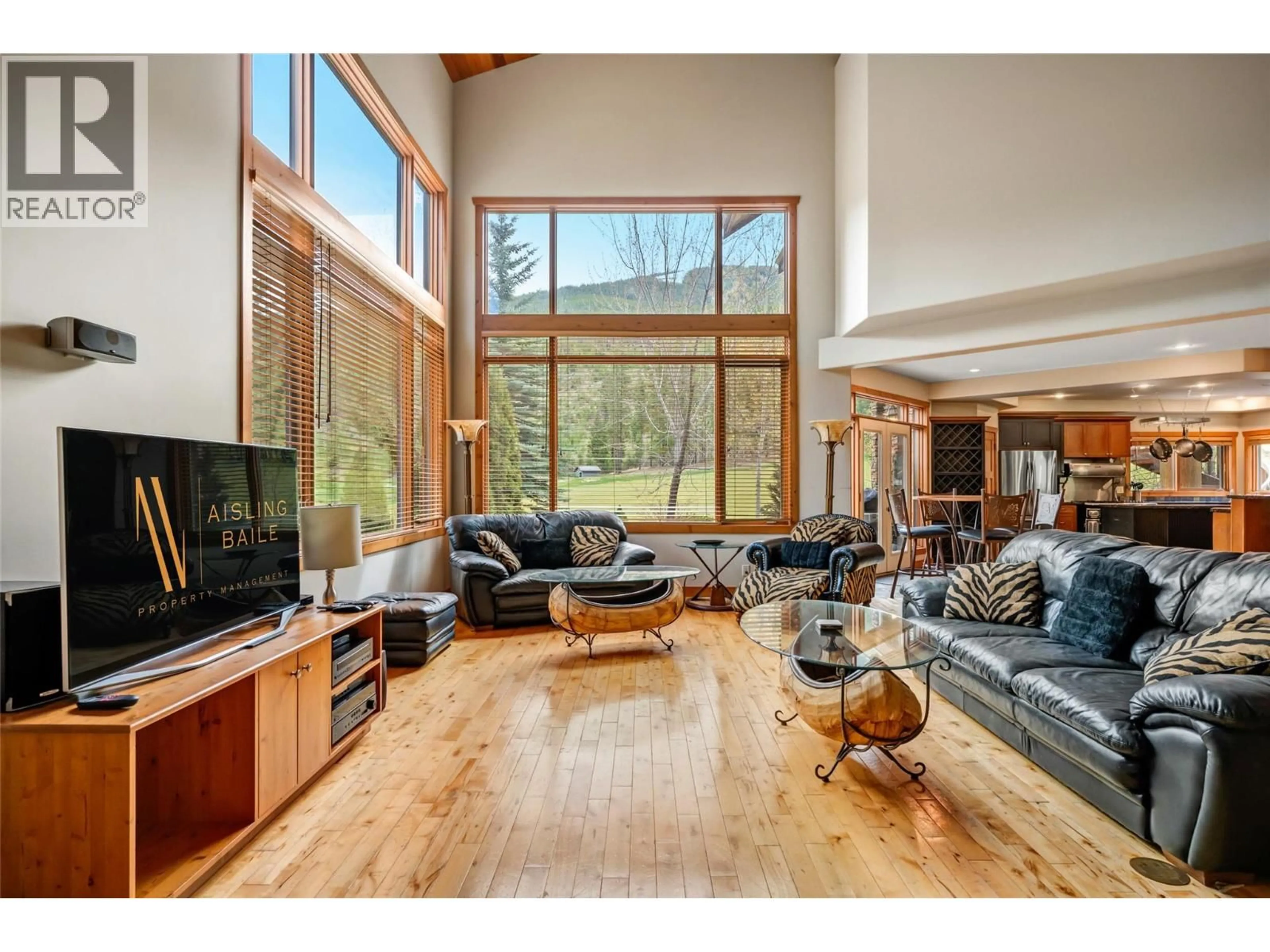 Living room with furniture, wood/laminate floor for 1802 GREYWOLF DRIVE, Panorama British Columbia V0A1T0