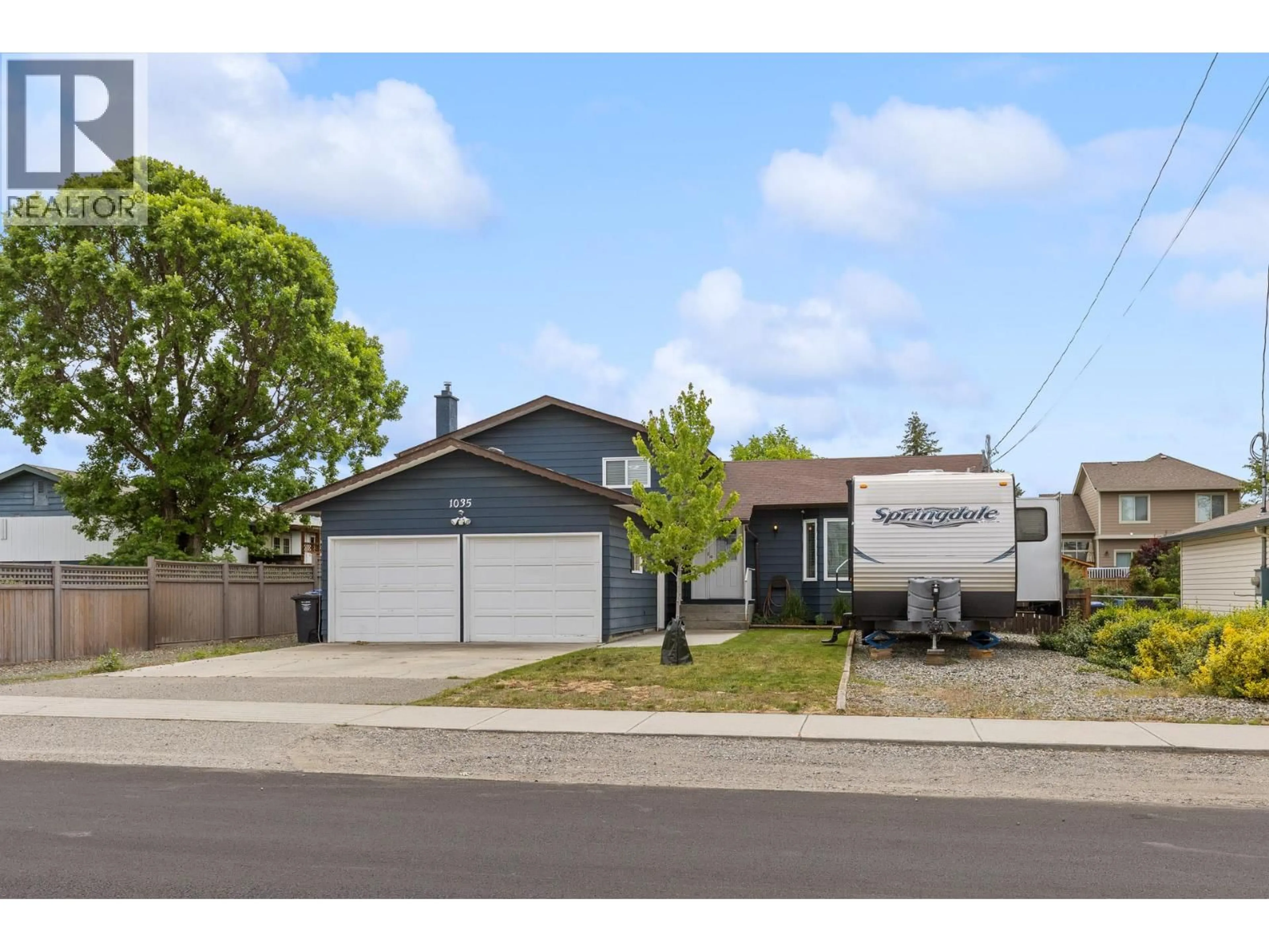 Home with vinyl exterior material, street for 1035 ELWYN ROAD, Kelowna British Columbia V1X1P5