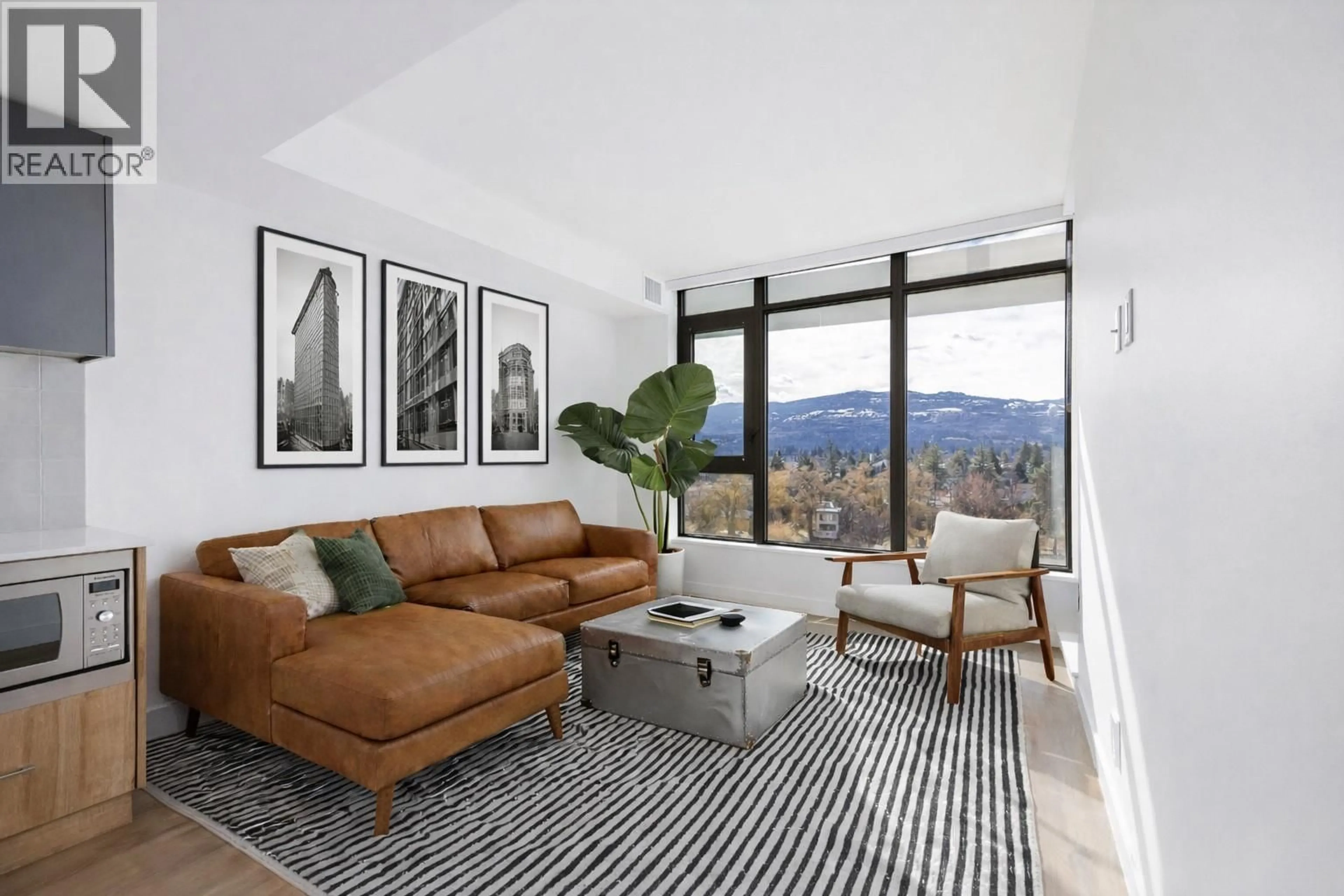 Living room with furniture, unknown for 705 - 3699 CAPOZZI ROAD, Kelowna British Columbia V1W3L2