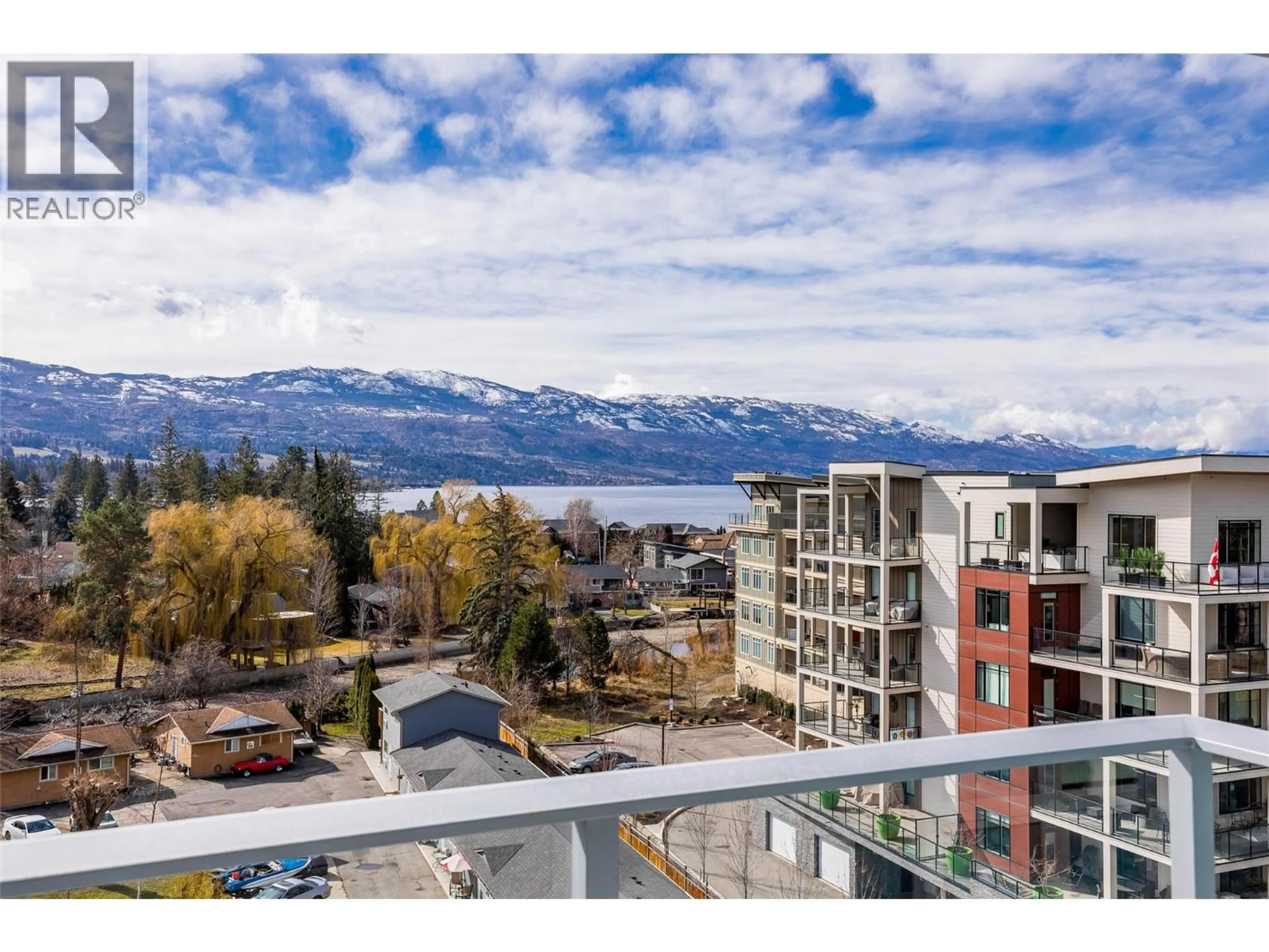 A pic from outside/outdoor area/front of a property/back of a property/a pic from drone, water/lake/river/ocean view for 705 - 3699 CAPOZZI ROAD, Kelowna British Columbia V1W3L2