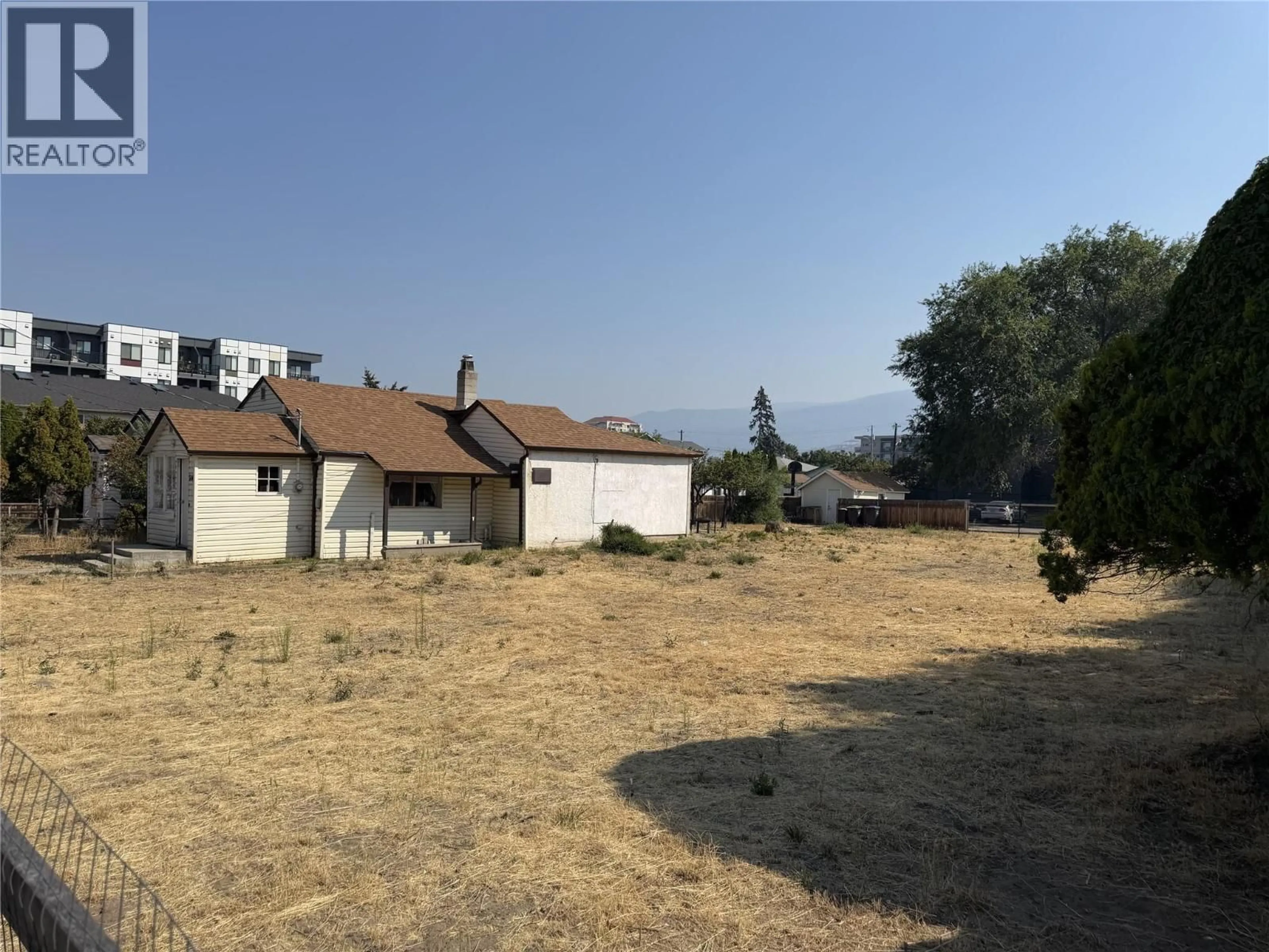 A pic from outside/outdoor area/front of a property/back of a property/a pic from drone, street for RIGSBY STREET, Penticton British Columbia V2A5S7