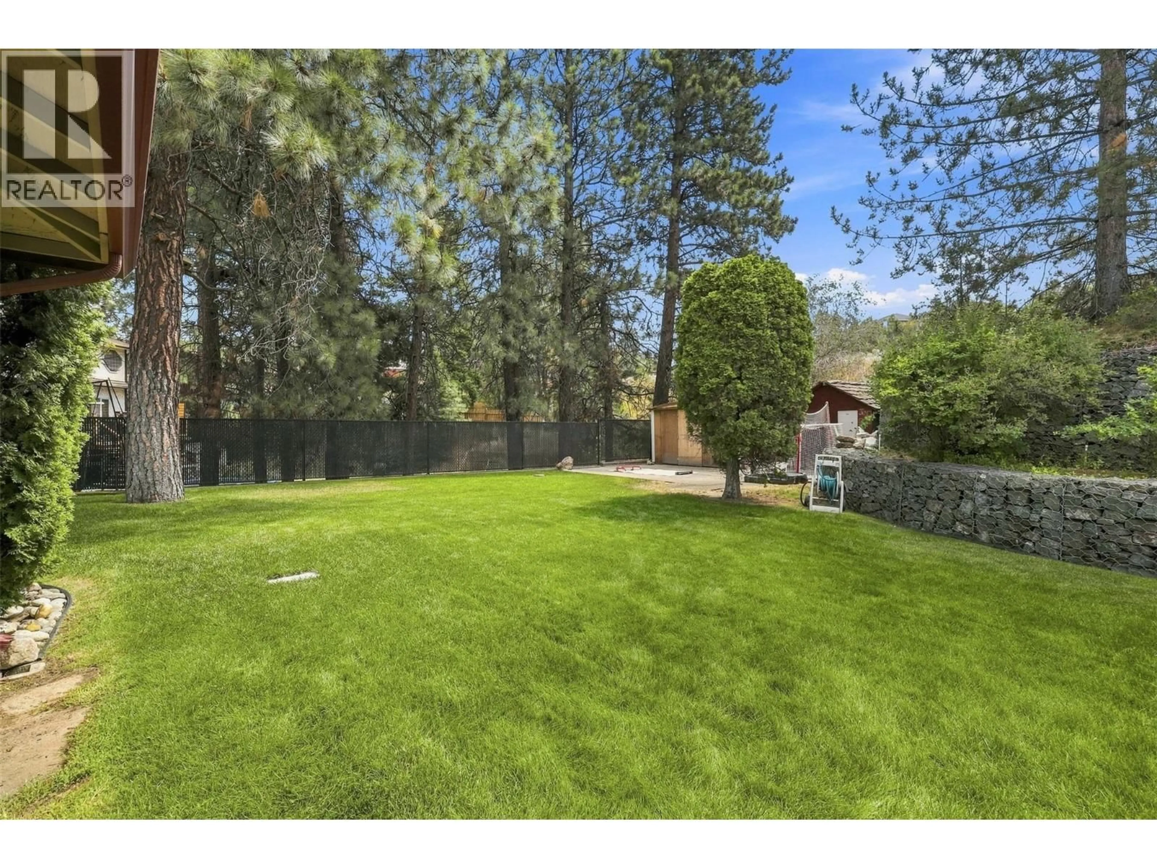 A pic from outside/outdoor area/front of a property/back of a property/a pic from drone, forest/trees view for 779 GLENEAGLES DRIVE, Kamloops British Columbia V2E1J7