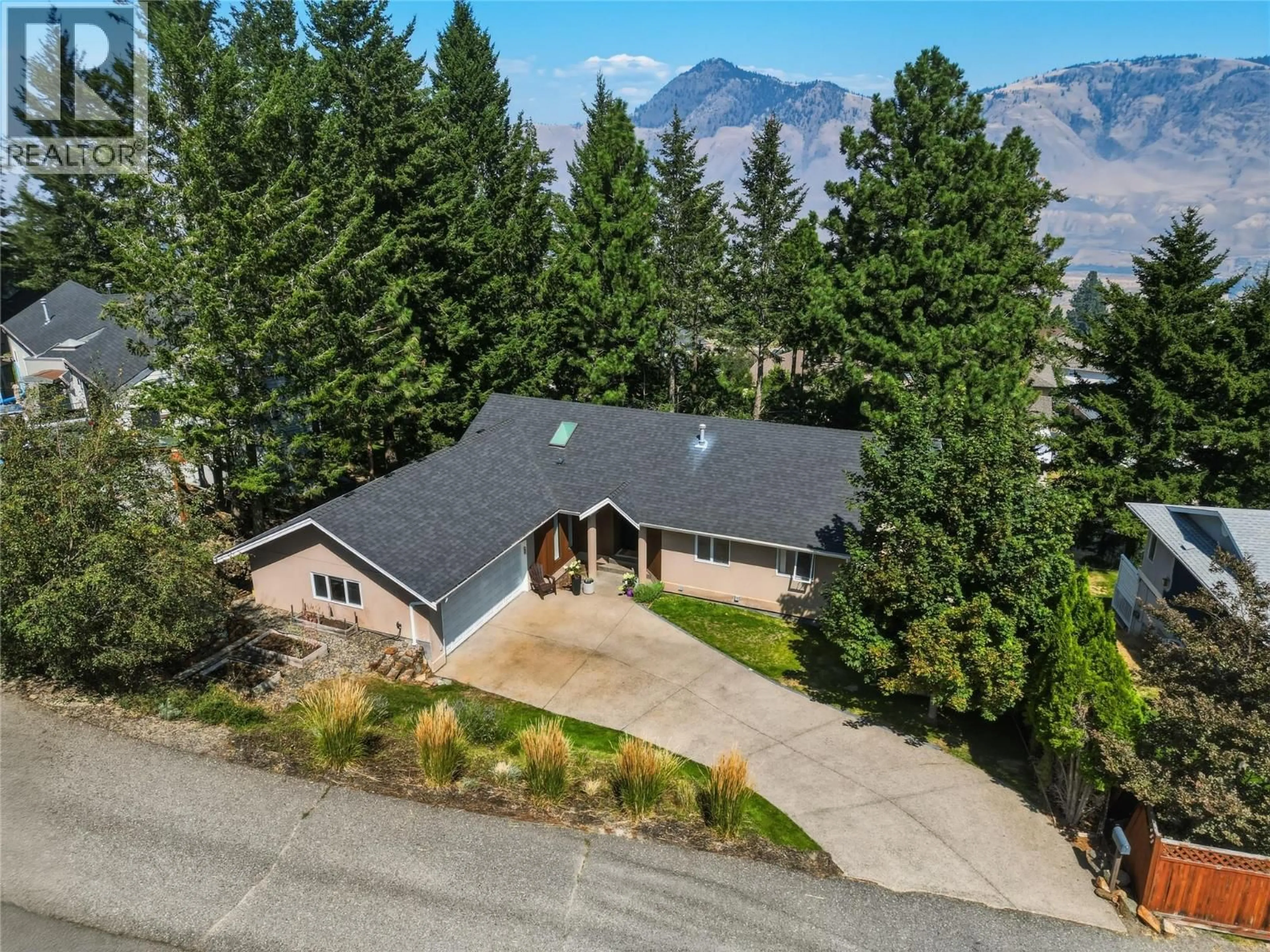 A pic from outside/outdoor area/front of a property/back of a property/a pic from drone, mountain view for 1937 SKEENA DRIVE, Kamloops British Columbia V2E2P3