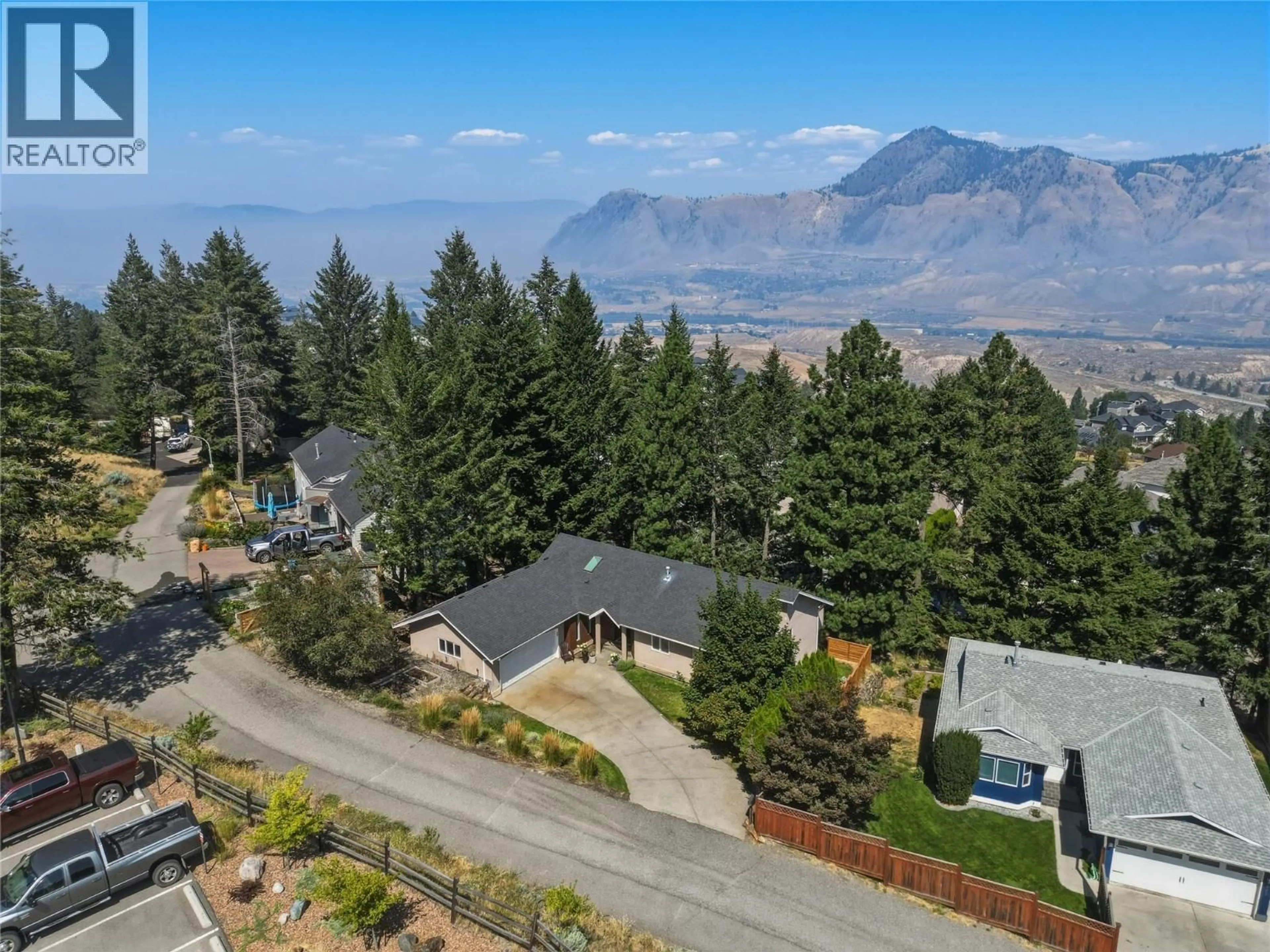 A pic from outside/outdoor area/front of a property/back of a property/a pic from drone, mountain view for 1937 SKEENA DRIVE, Kamloops British Columbia V2E2P3