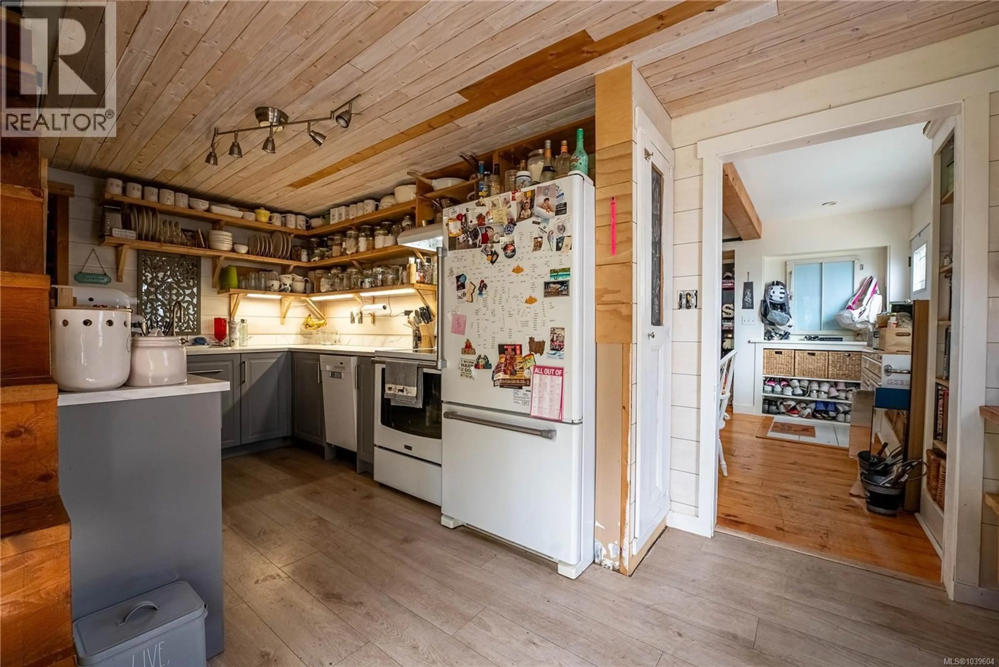 Open concept kitchen, wood/laminate floor for 1011 COSTIN AVENUE, Langford British Columbia V9B2T4