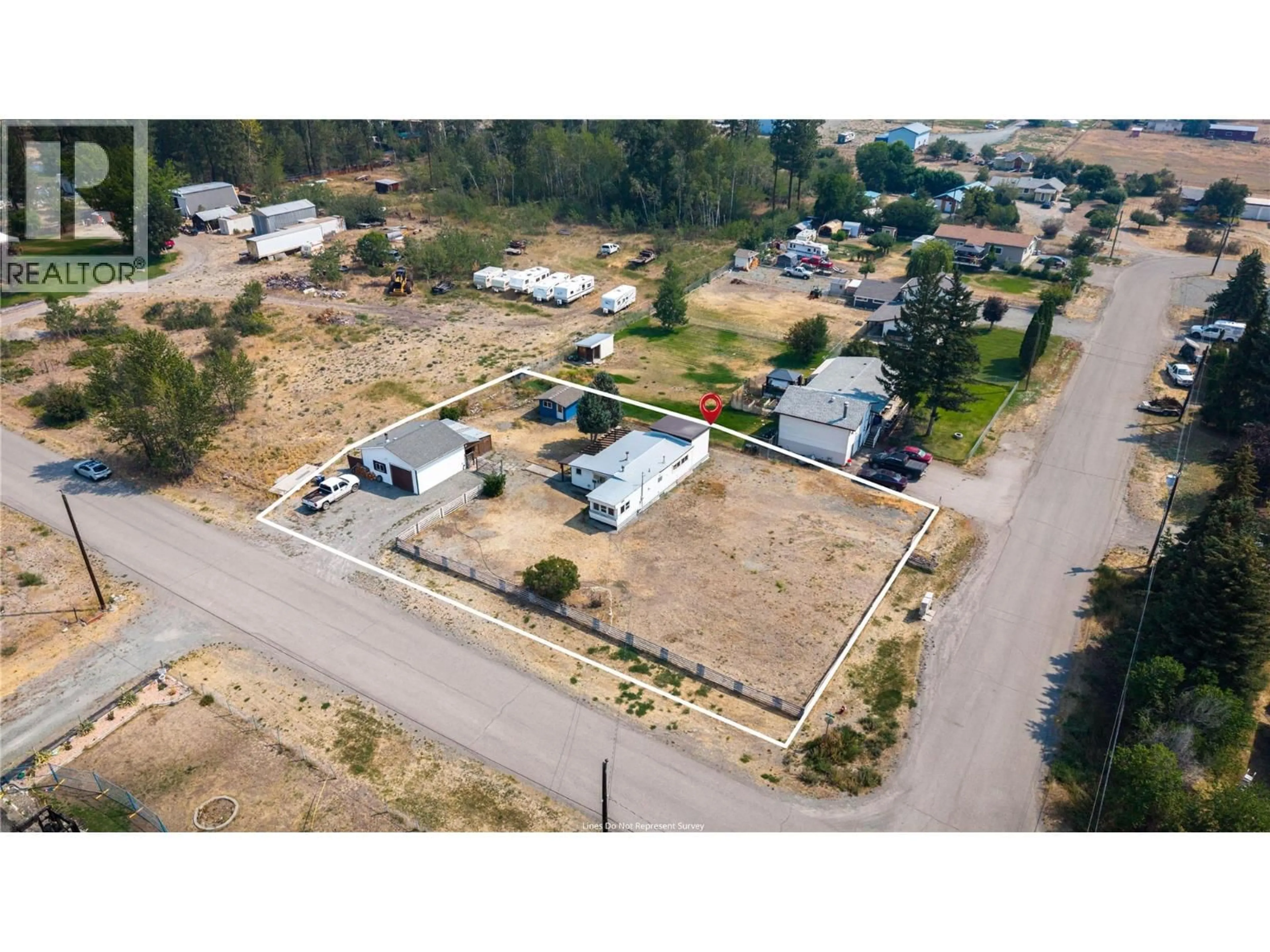 A pic from outside/outdoor area/front of a property/back of a property/a pic from drone, street for 443 MORGAN AVENUE, Merritt British Columbia V0K1Y0