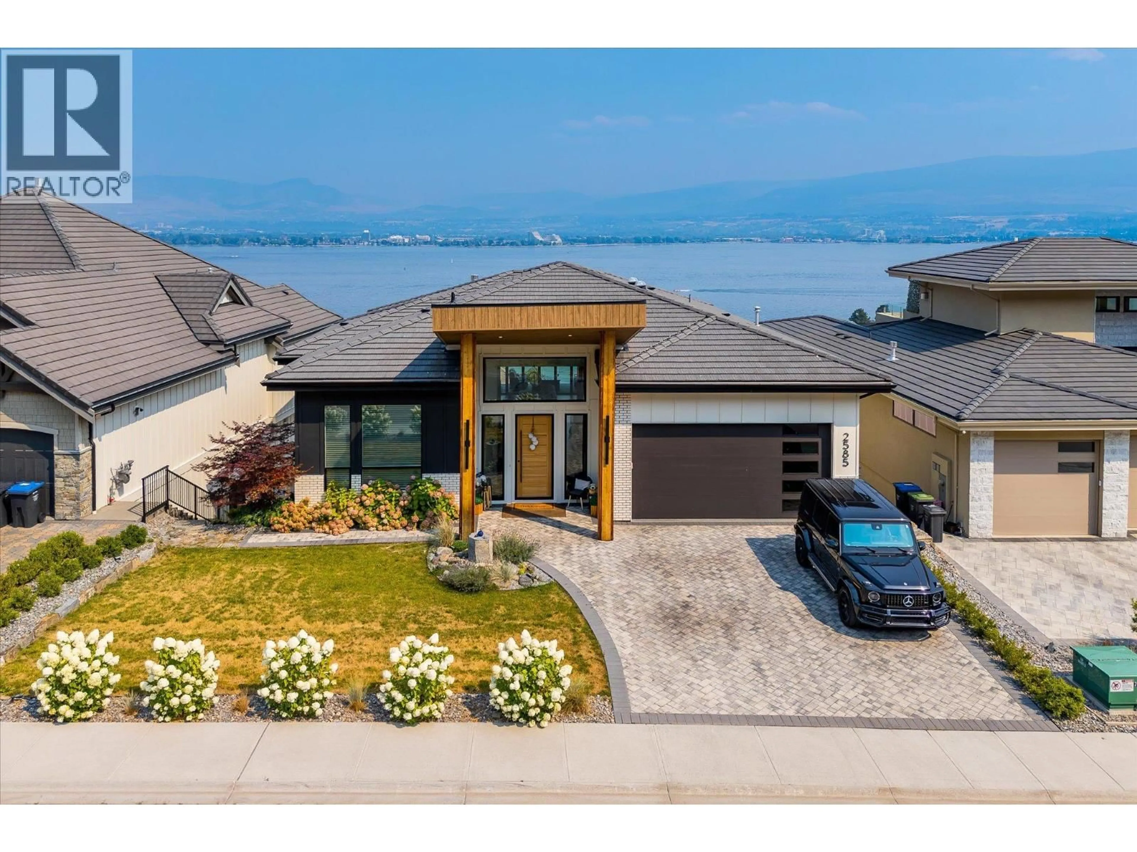 A pic from outside/outdoor area/front of a property/back of a property/a pic from drone, water/lake/river/ocean view for 2585 CASA PALMERO DRIVE, West Kelowna British Columbia V1Z4B1