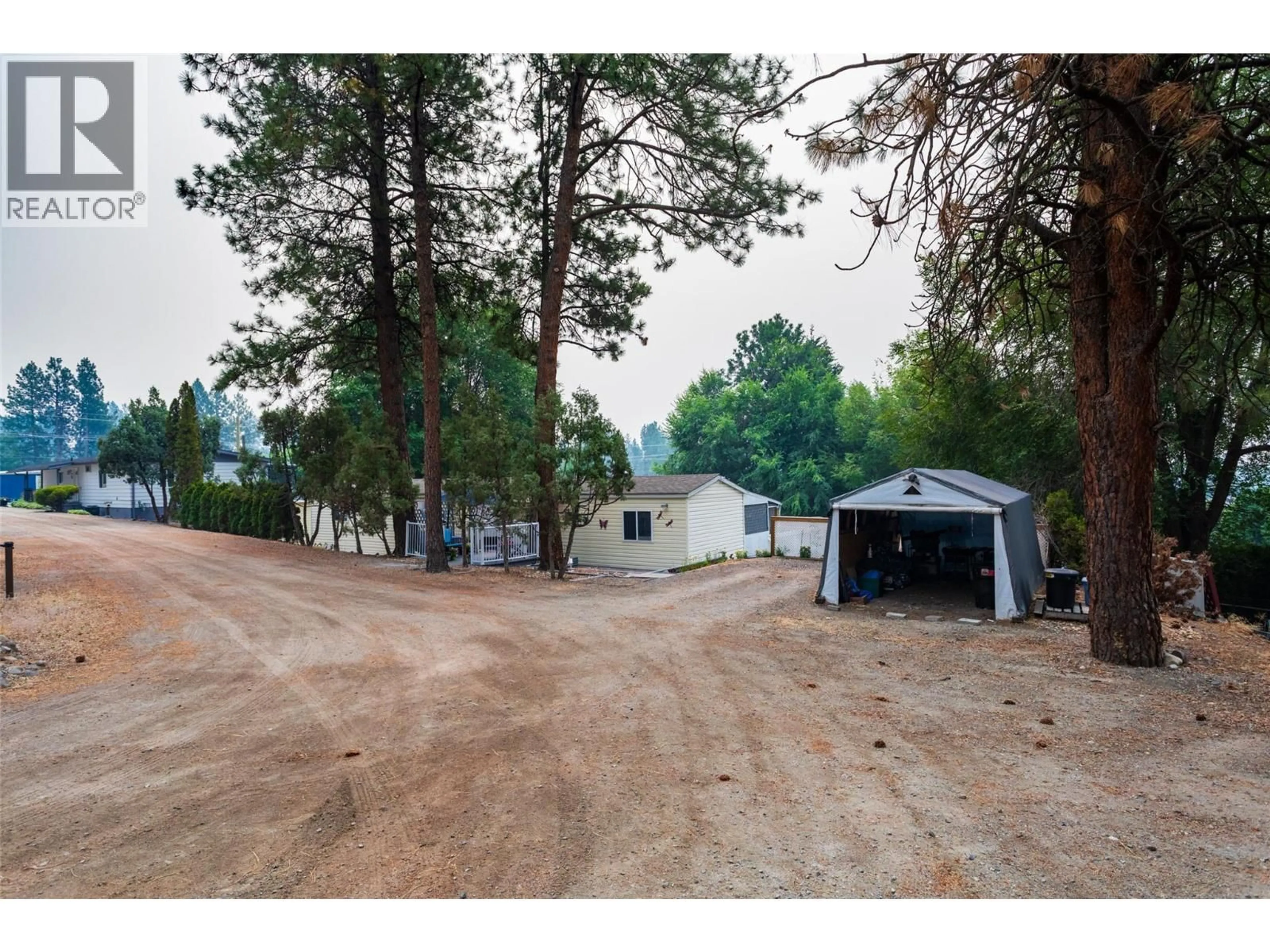A pic from outside/outdoor area/front of a property/back of a property/a pic from drone, forest/trees view for 18 - 3206 SHANNON LAKE ROAD, Westbank British Columbia V4T1V4