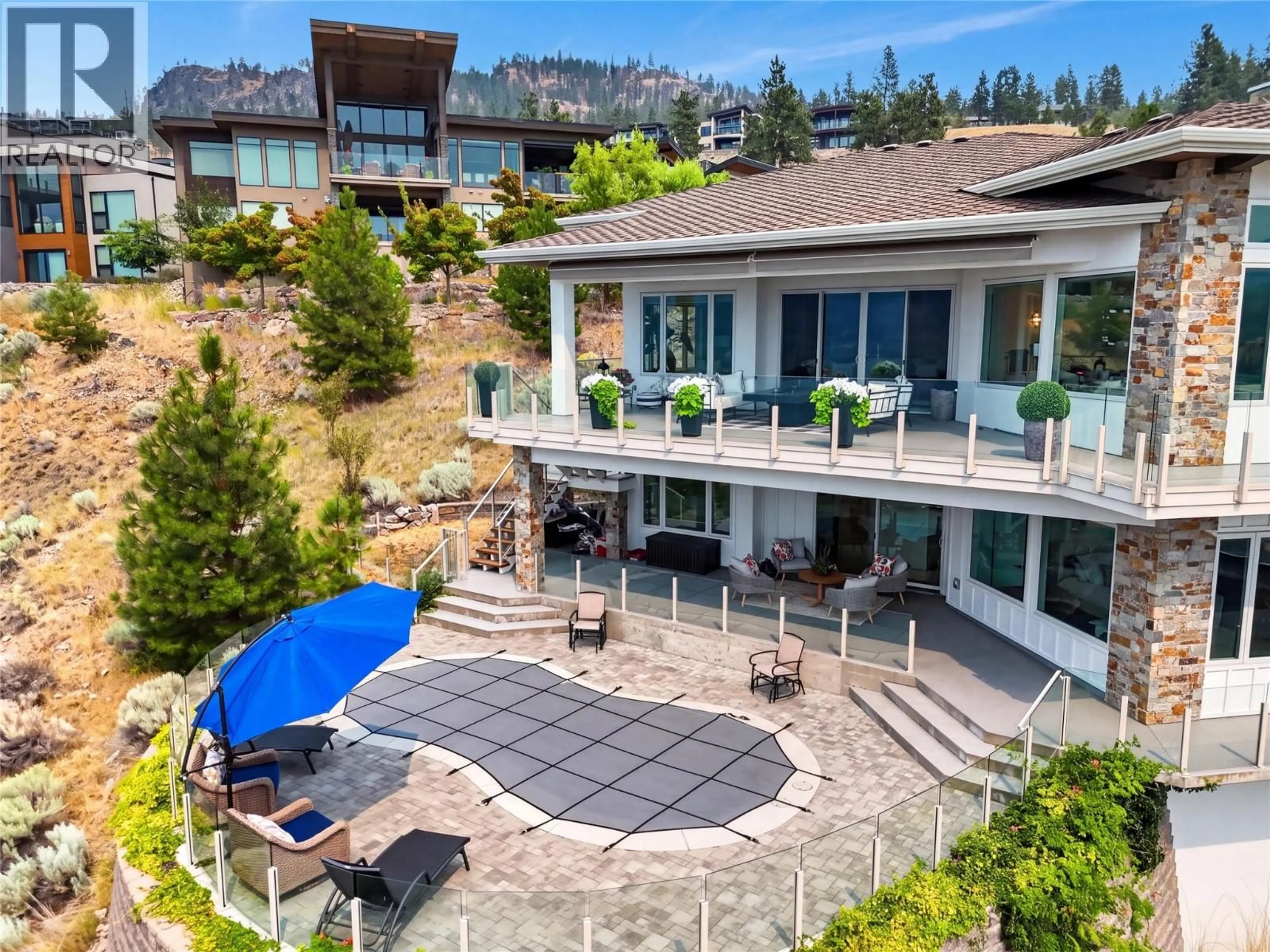 A pic from outside/outdoor area/front of a property/back of a property/a pic from drone, mountain view for 1610 GRANITE ROAD, Lake Country British Columbia V4V1M9