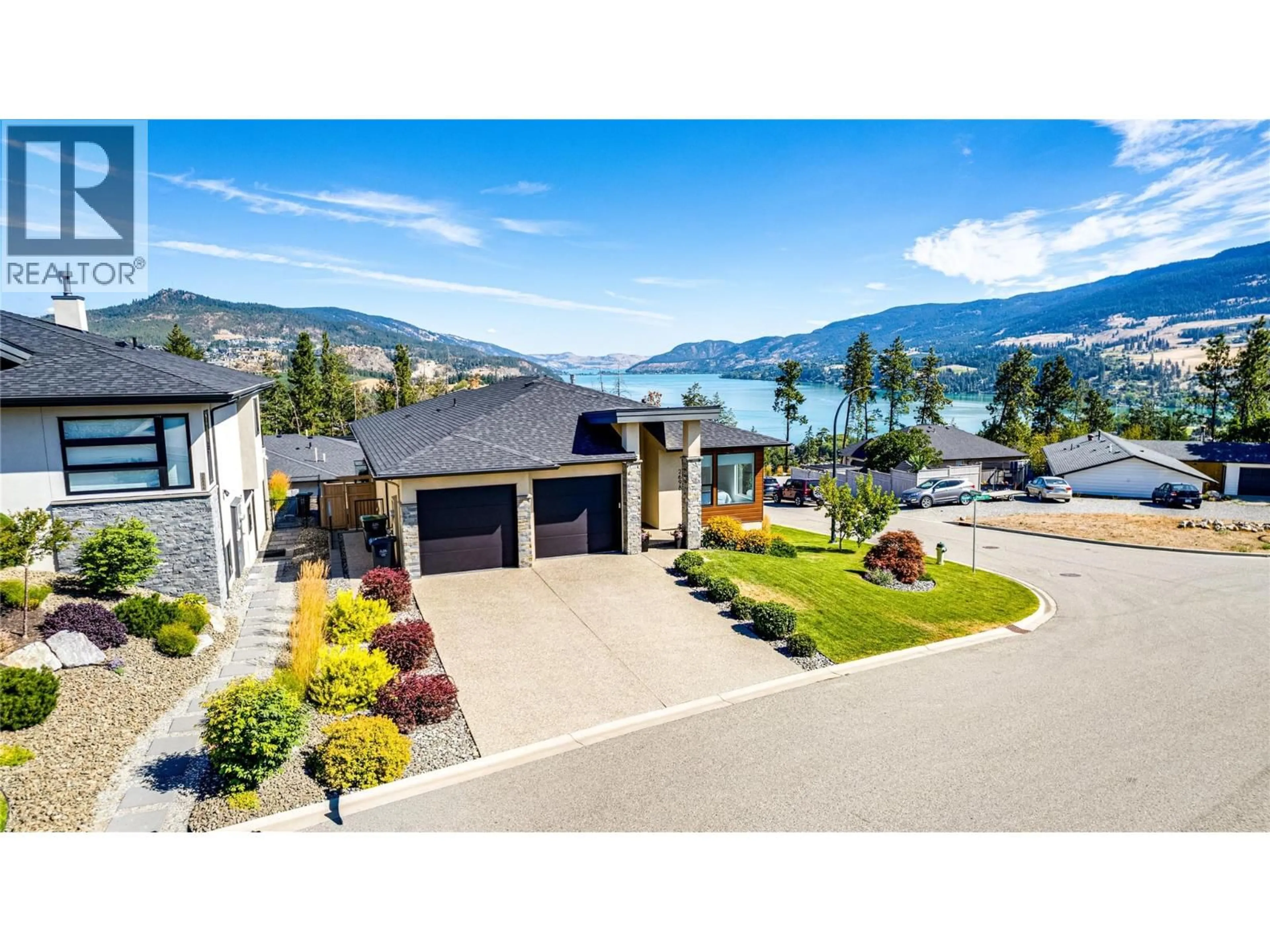 A pic from outside/outdoor area/front of a property/back of a property/a pic from drone, water/lake/river/ocean view for 2698 KOYAMA ROAD, Lake Country British Columbia V4V1H5