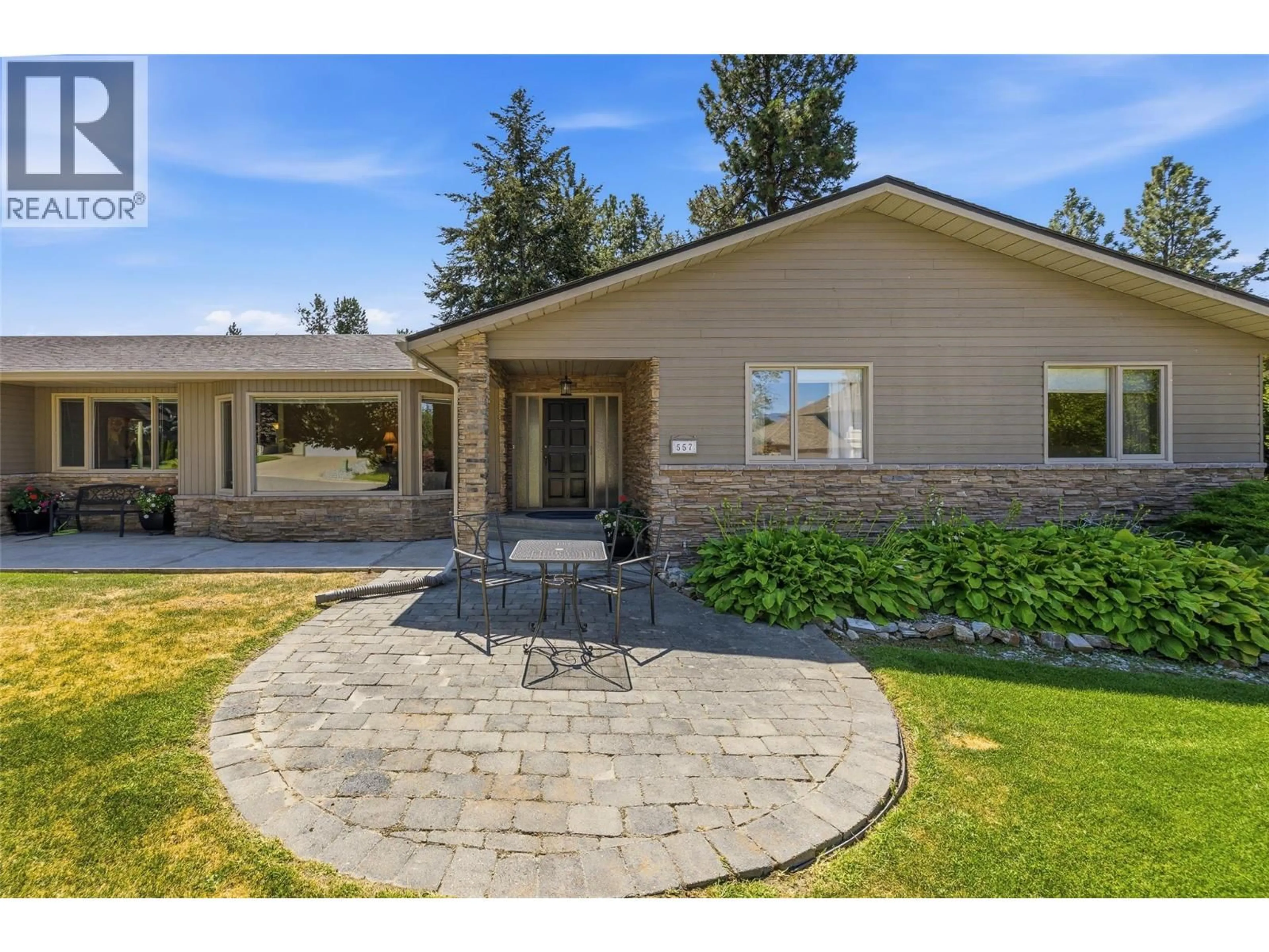 Home with brick exterior material, street for 557 VINTAGE TERRACE COURT, Kelowna British Columbia V1W2Z8