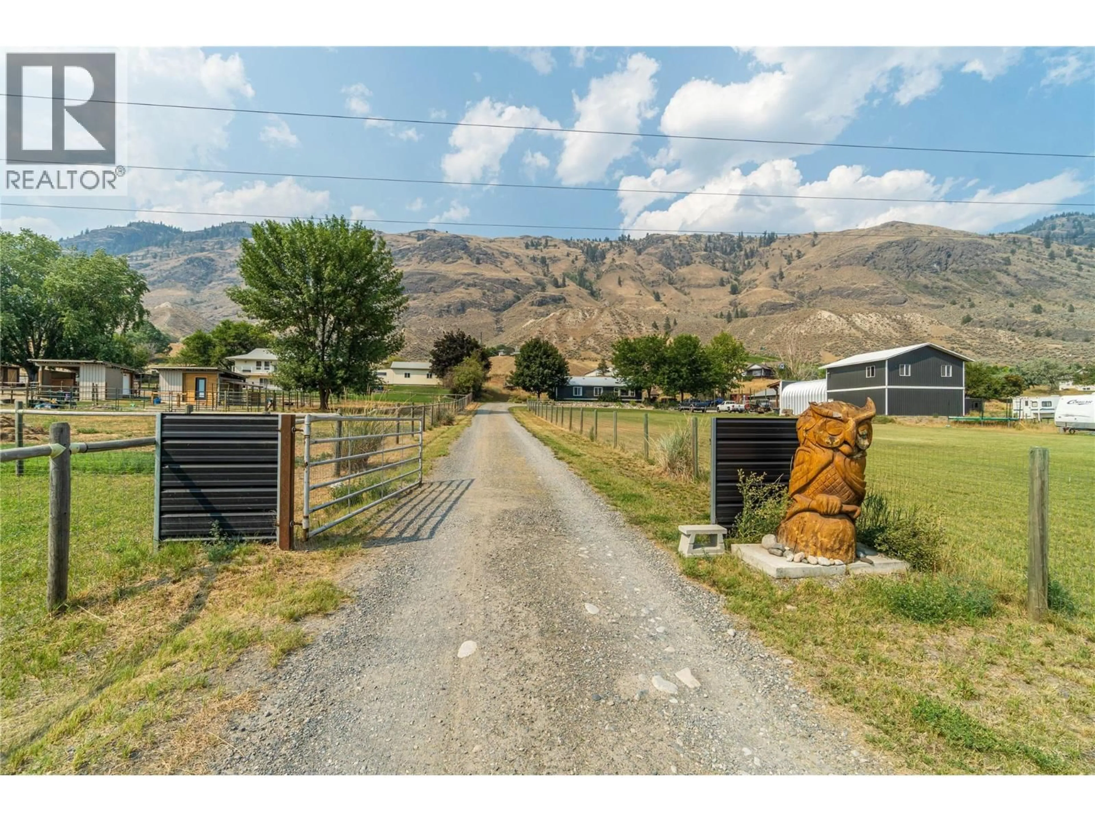 A pic from outside/outdoor area/front of a property/back of a property/a pic from drone, mountain view for 3227 SHUSWAP ROAD, Kamloops British Columbia V2H1T1
