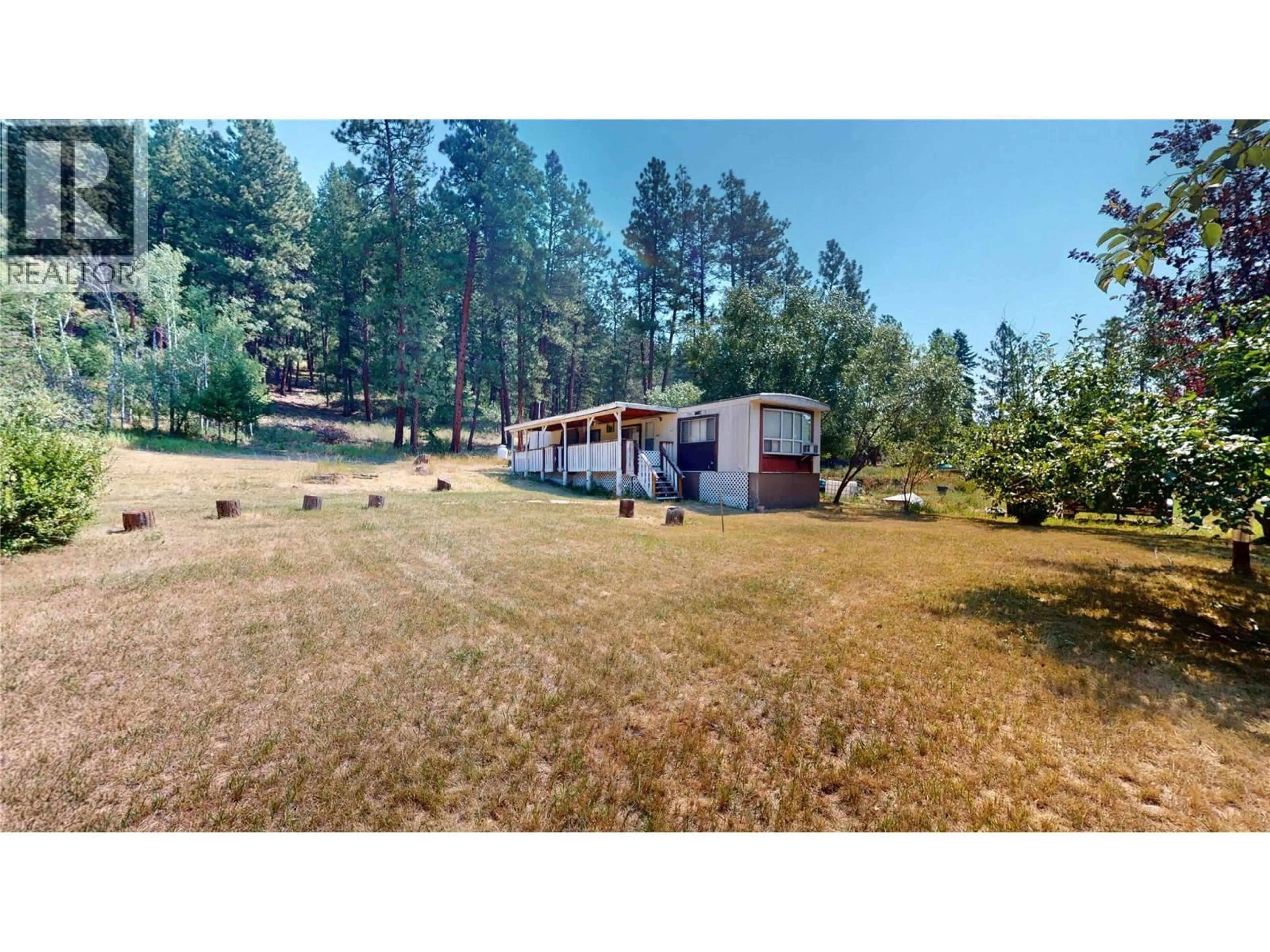 A pic from outside/outdoor area/front of a property/back of a property/a pic from drone, forest/trees view for 6294 ASH ROAD, Wasa British Columbia V0B2K0