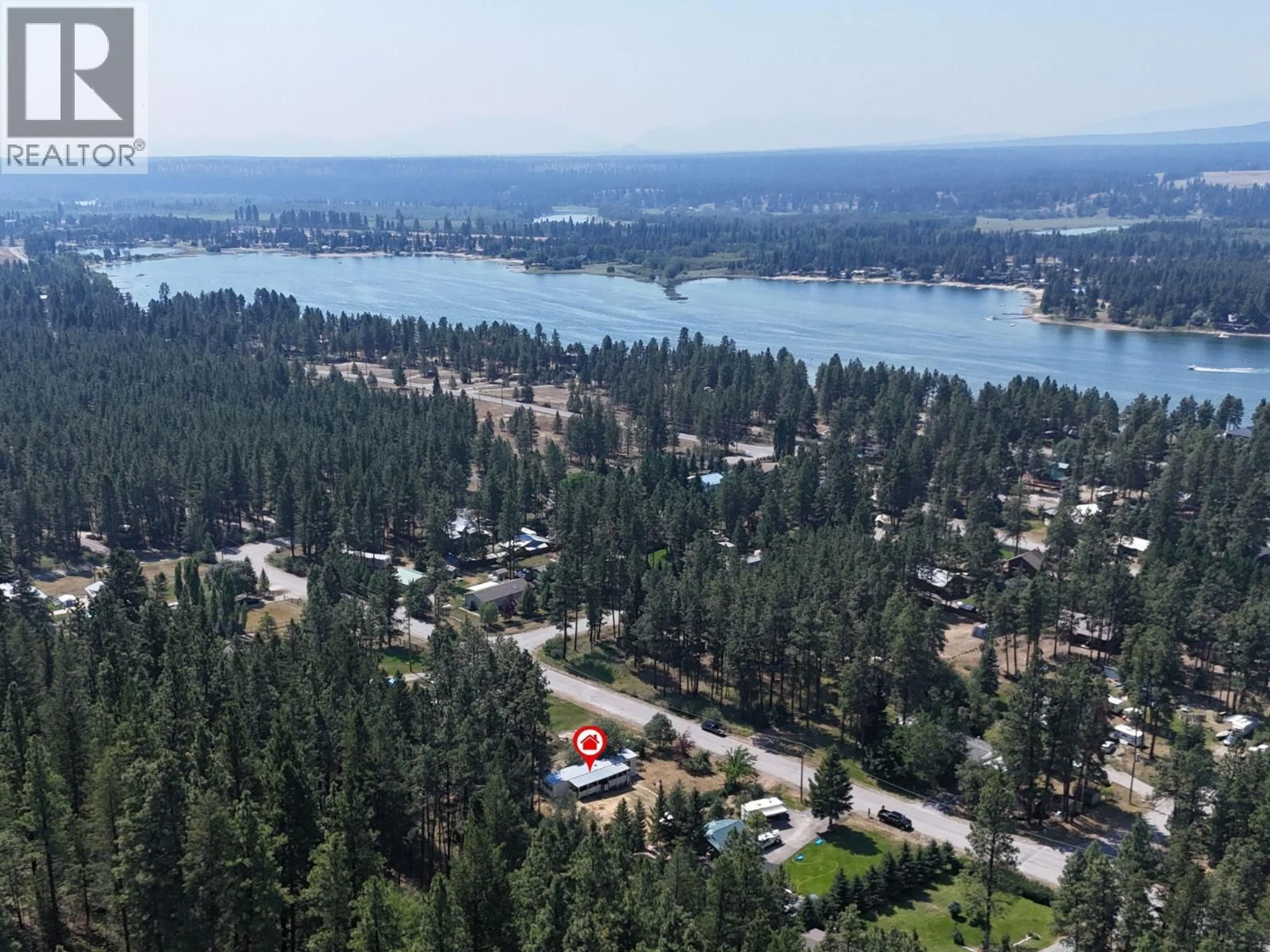 A pic from outside/outdoor area/front of a property/back of a property/a pic from drone, water/lake/river/ocean view for 6294 ASH ROAD, Wasa British Columbia V0B2K0