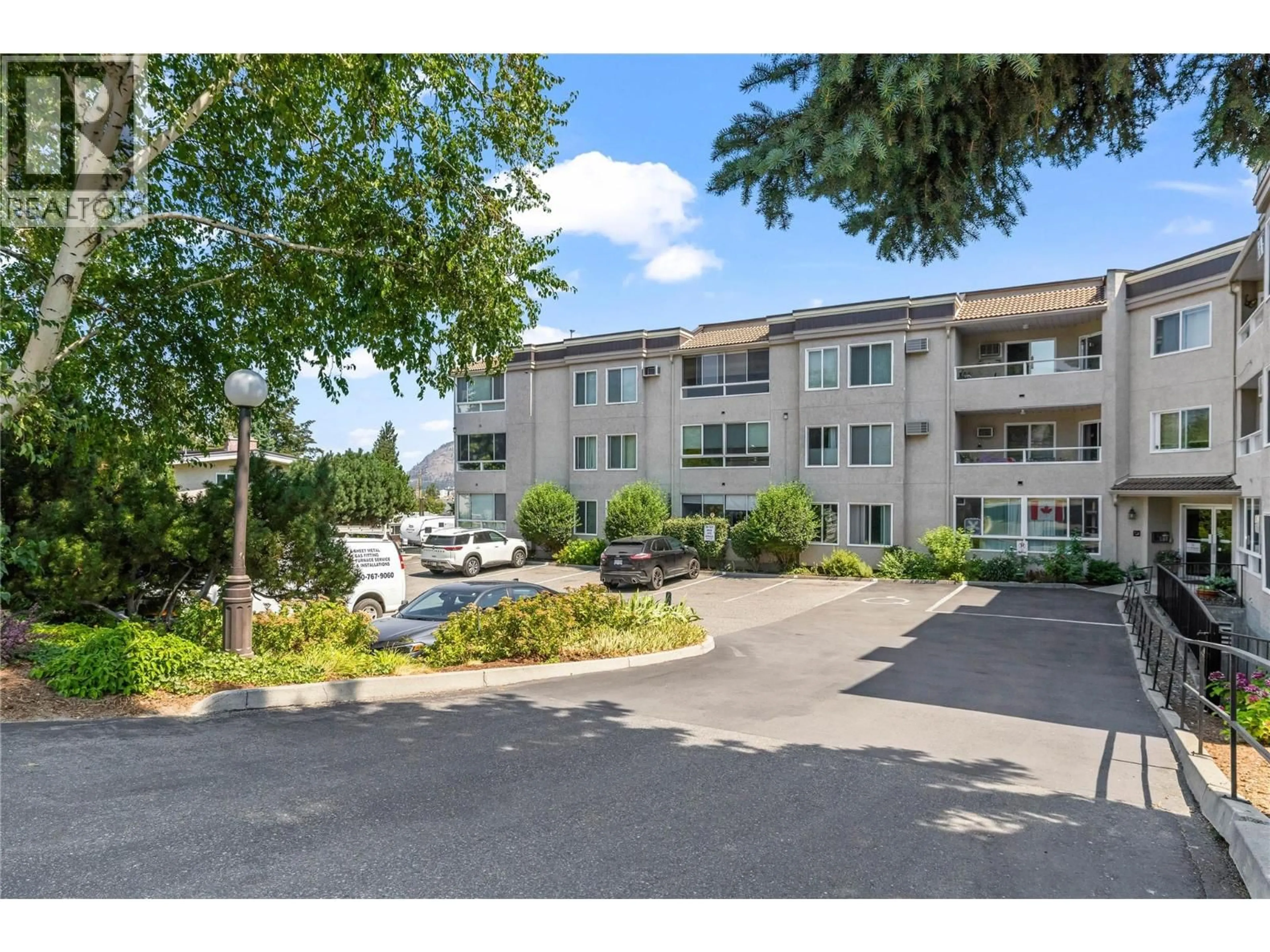 A pic from outside/outdoor area/front of a property/back of a property/a pic from drone, mountain view for 107 - 3815 BROWN ROAD, West Kelowna British Columbia V4T1R8
