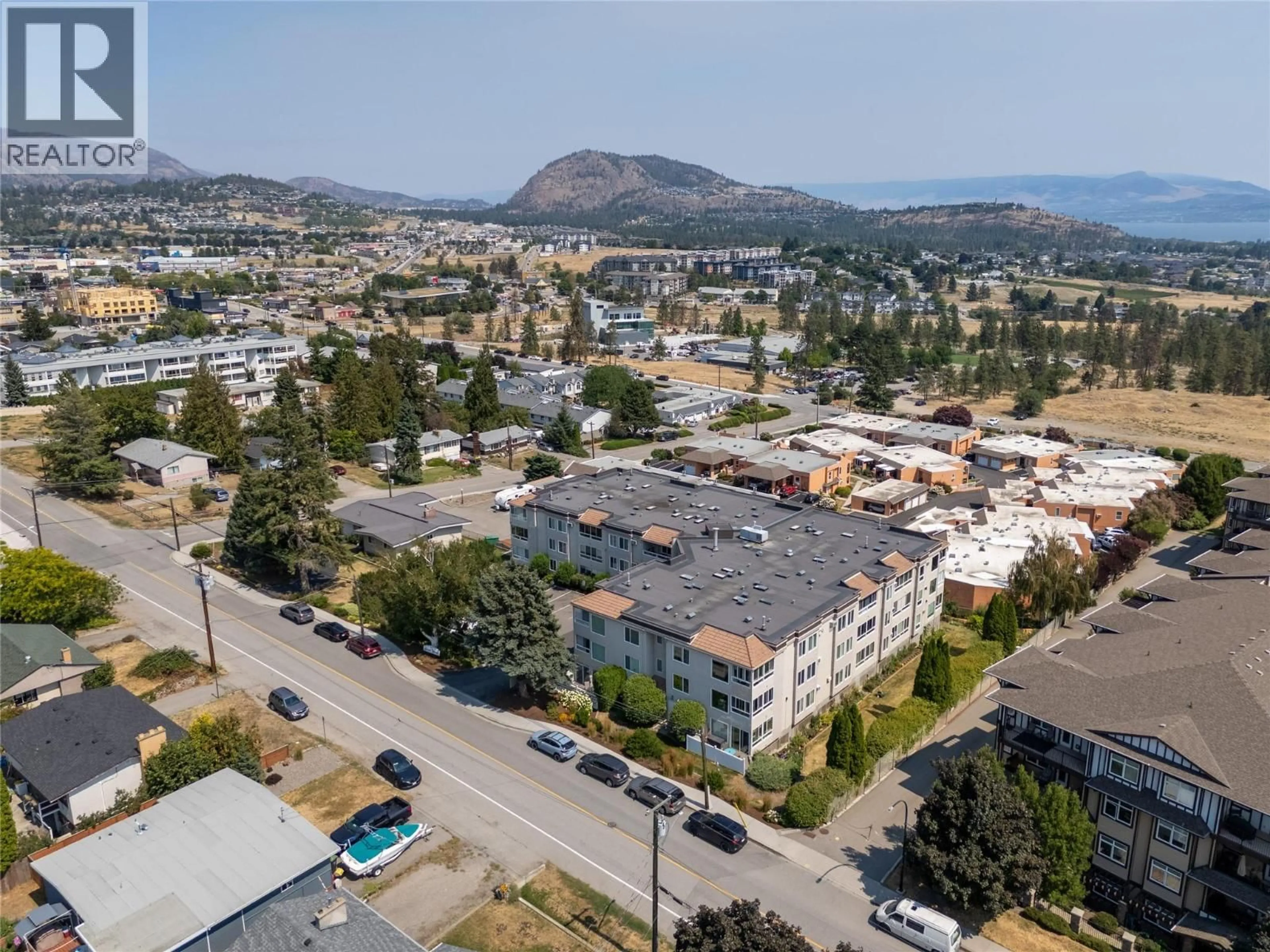 A pic from outside/outdoor area/front of a property/back of a property/a pic from drone, mountain view for 107 - 3815 BROWN ROAD, West Kelowna British Columbia V4T1R8