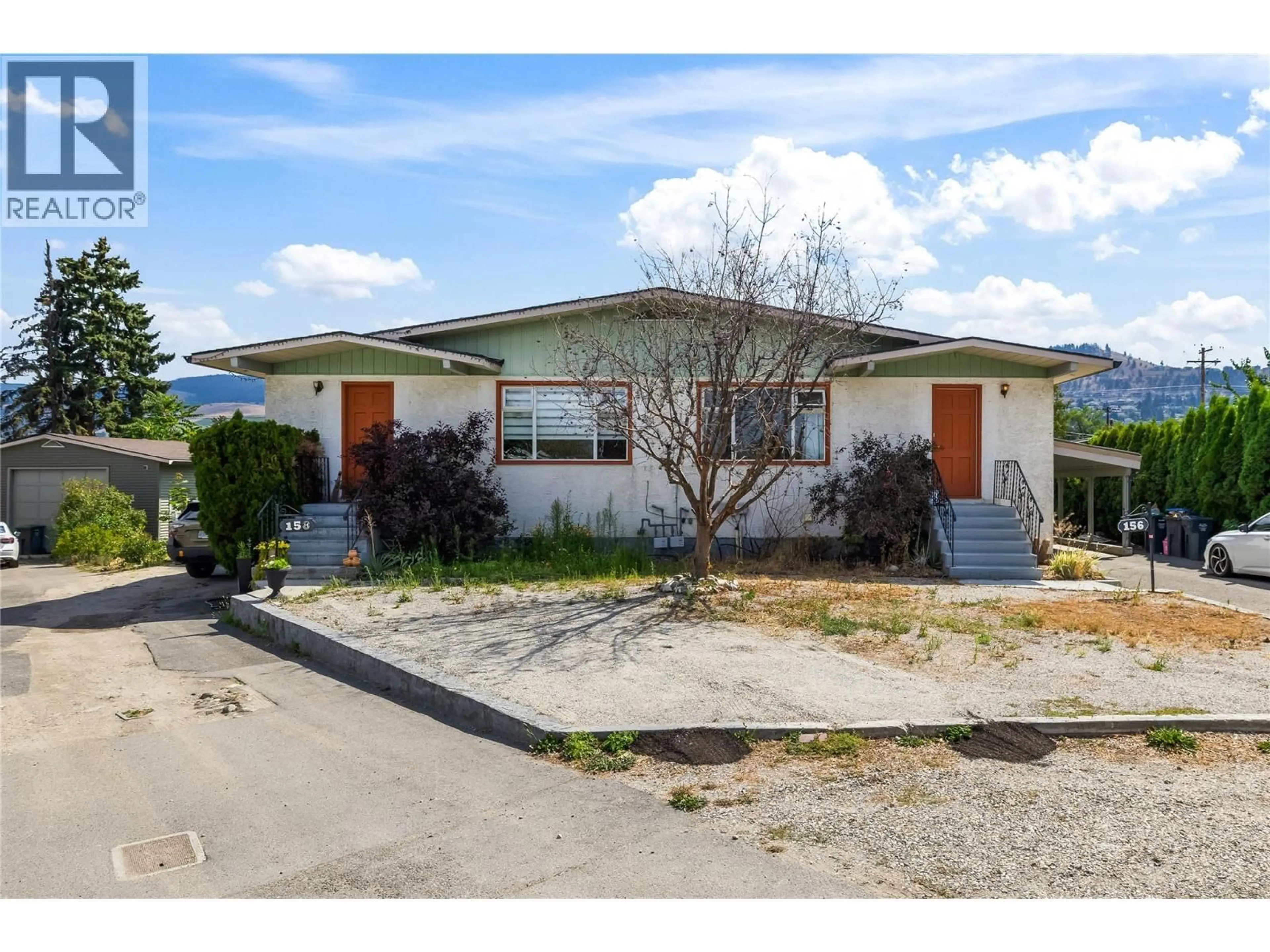 Home with vinyl exterior material, street for 156-158 ADVENTURE ROAD, Kelowna British Columbia V1X1N4