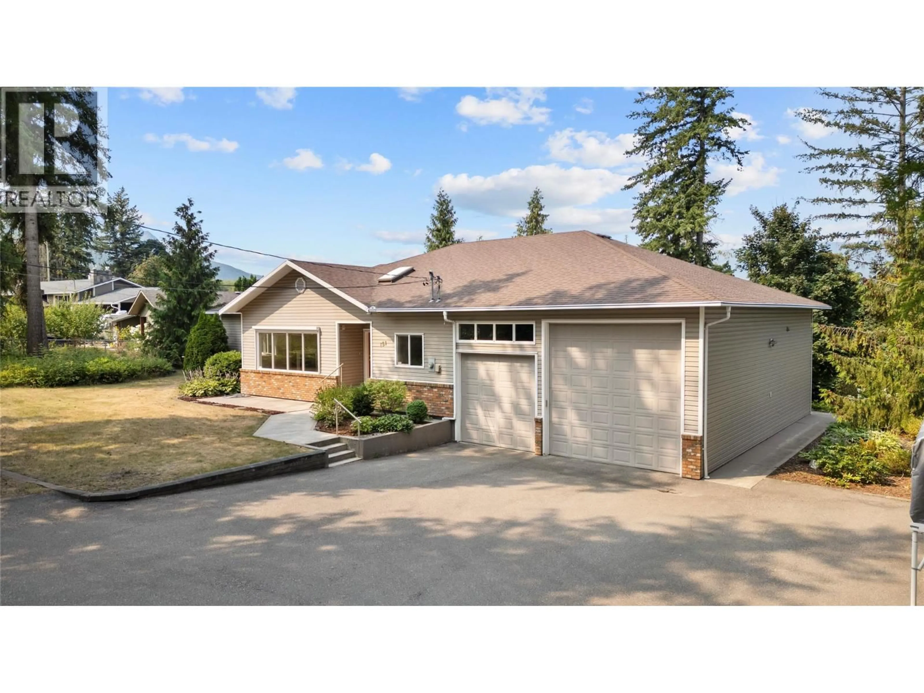 Home with vinyl exterior material, street for 151 25 STREET NORTHEAST, Salmon Arm British Columbia V1E2A8