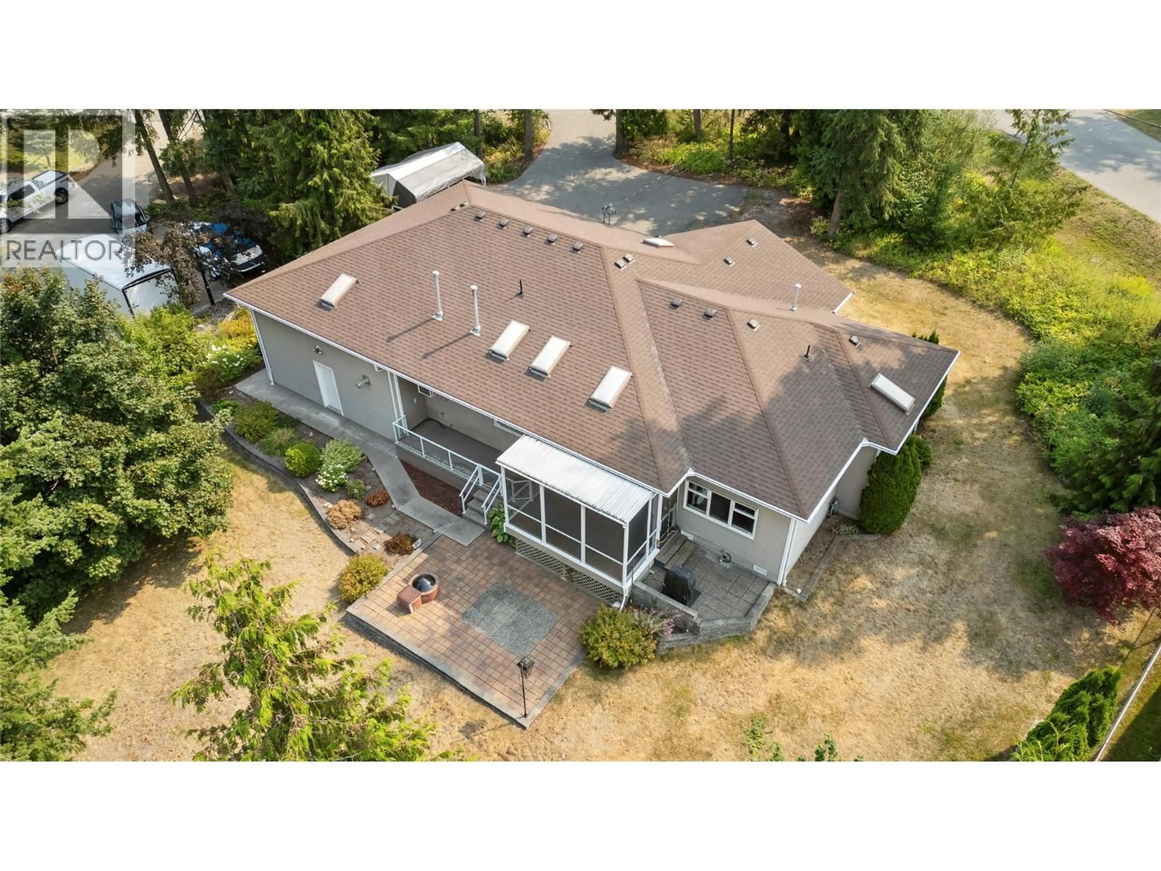 A pic from outside/outdoor area/front of a property/back of a property/a pic from drone, building for 151 25 STREET NORTHEAST, Salmon Arm British Columbia V1E2A8