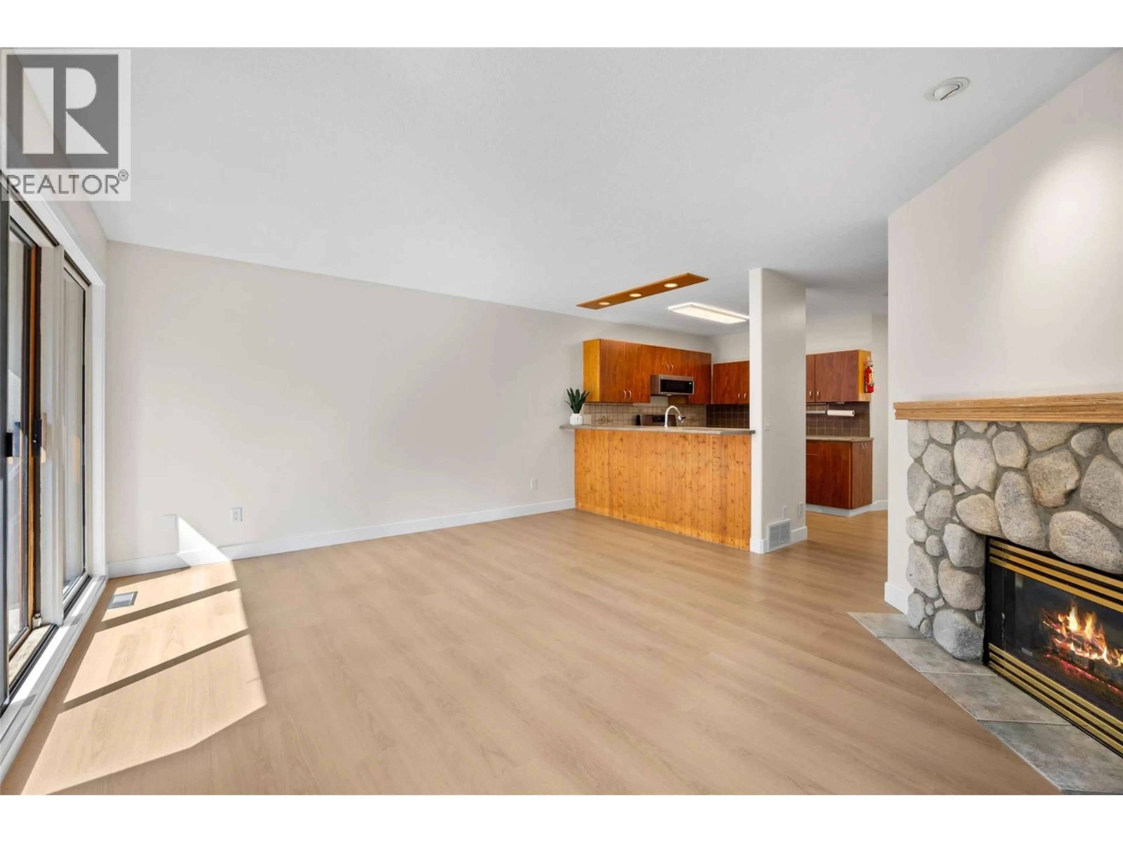 Open concept kitchen, wood/laminate floor for 3 - 2160 SUN PEAKS ROAD, Sun Peaks British Columbia V0E5N0