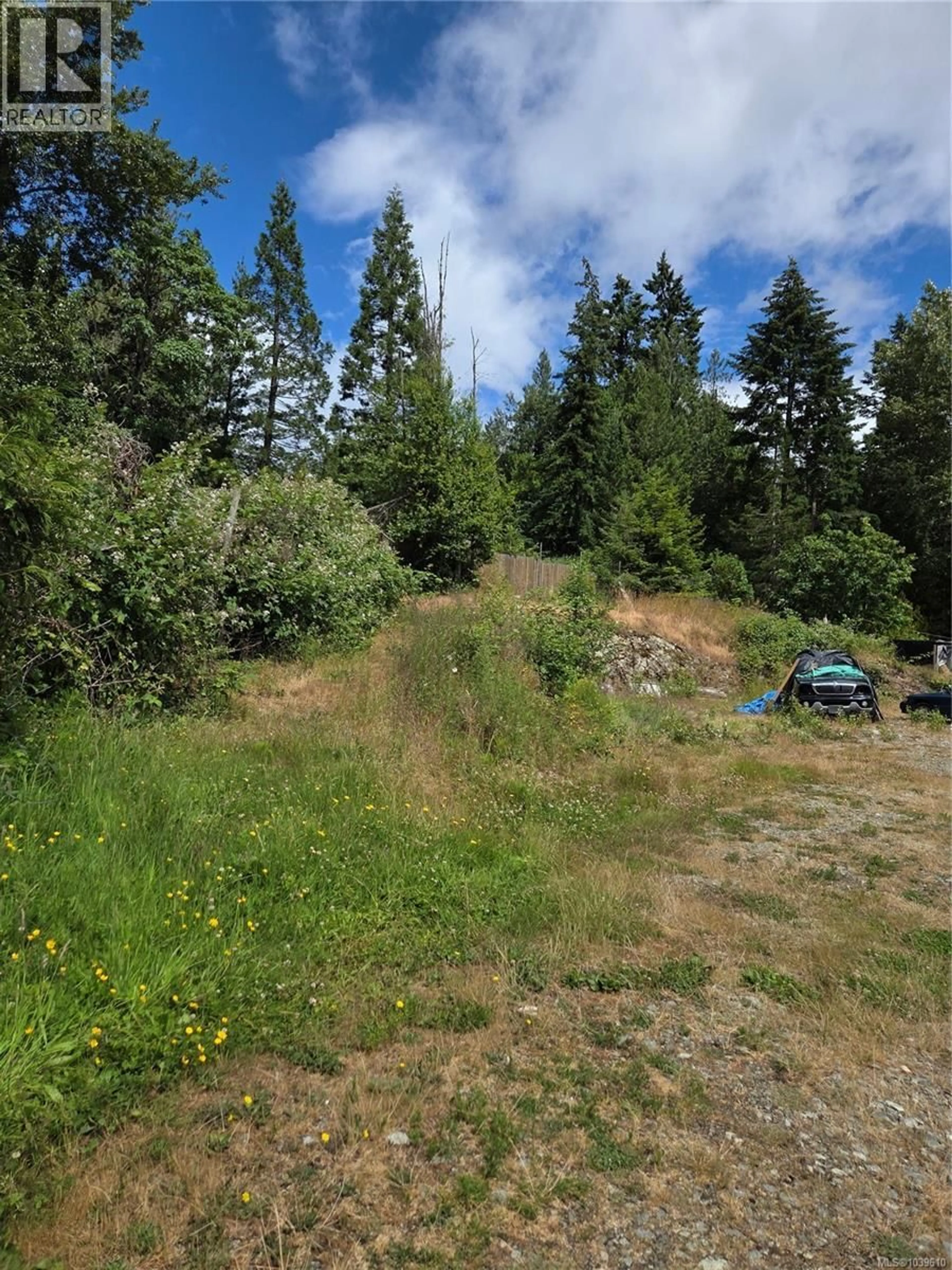 A pic from outside/outdoor area/front of a property/back of a property/a pic from drone, forest/trees view for 1824 SWARTZ BAY ROAD, North Saanich British Columbia V8L5R2