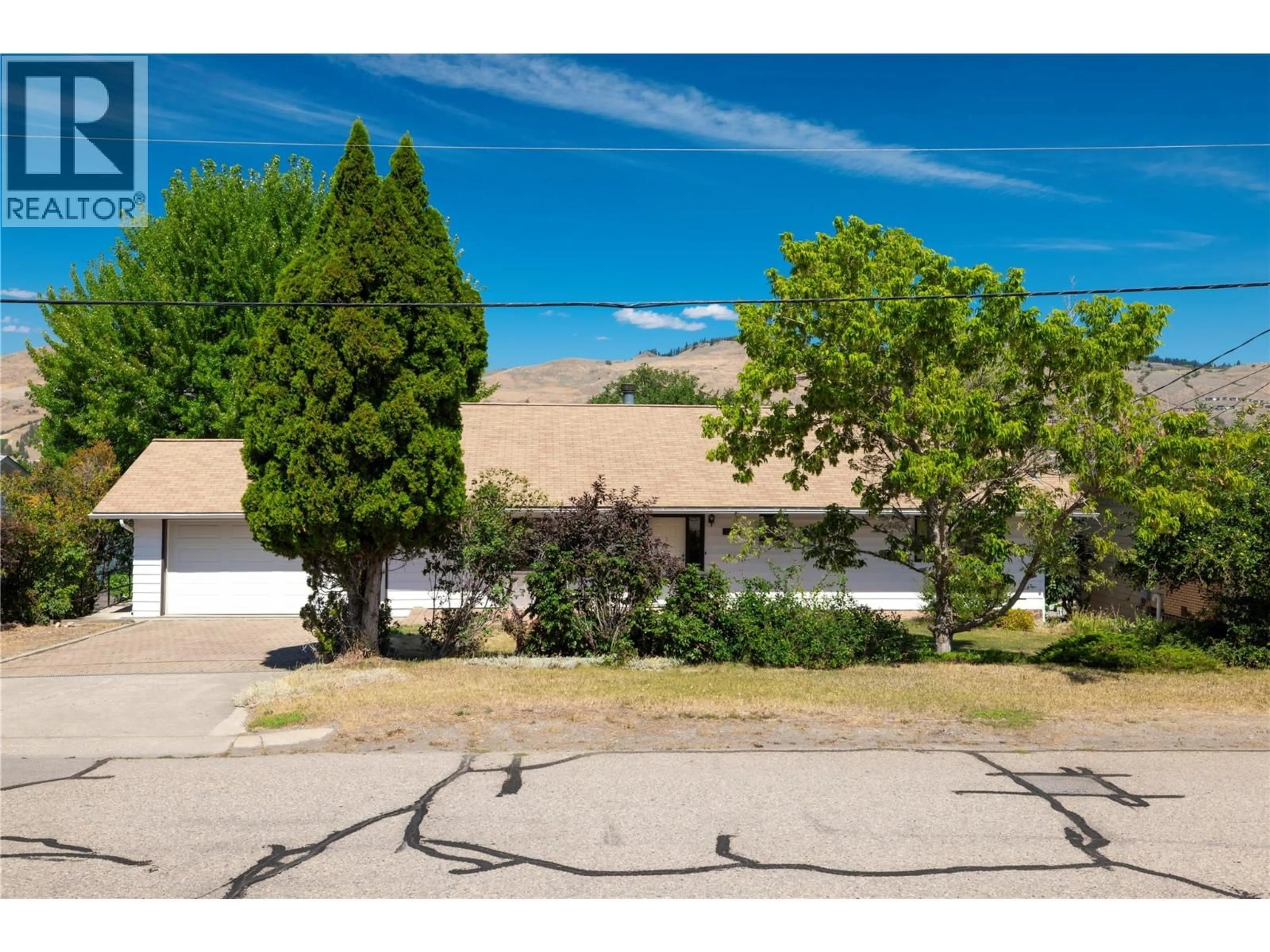 A pic from outside/outdoor area/front of a property/back of a property/a pic from drone, unknown for 7315 LONGACRE DRIVE, Vernon British Columbia V1H1H5
