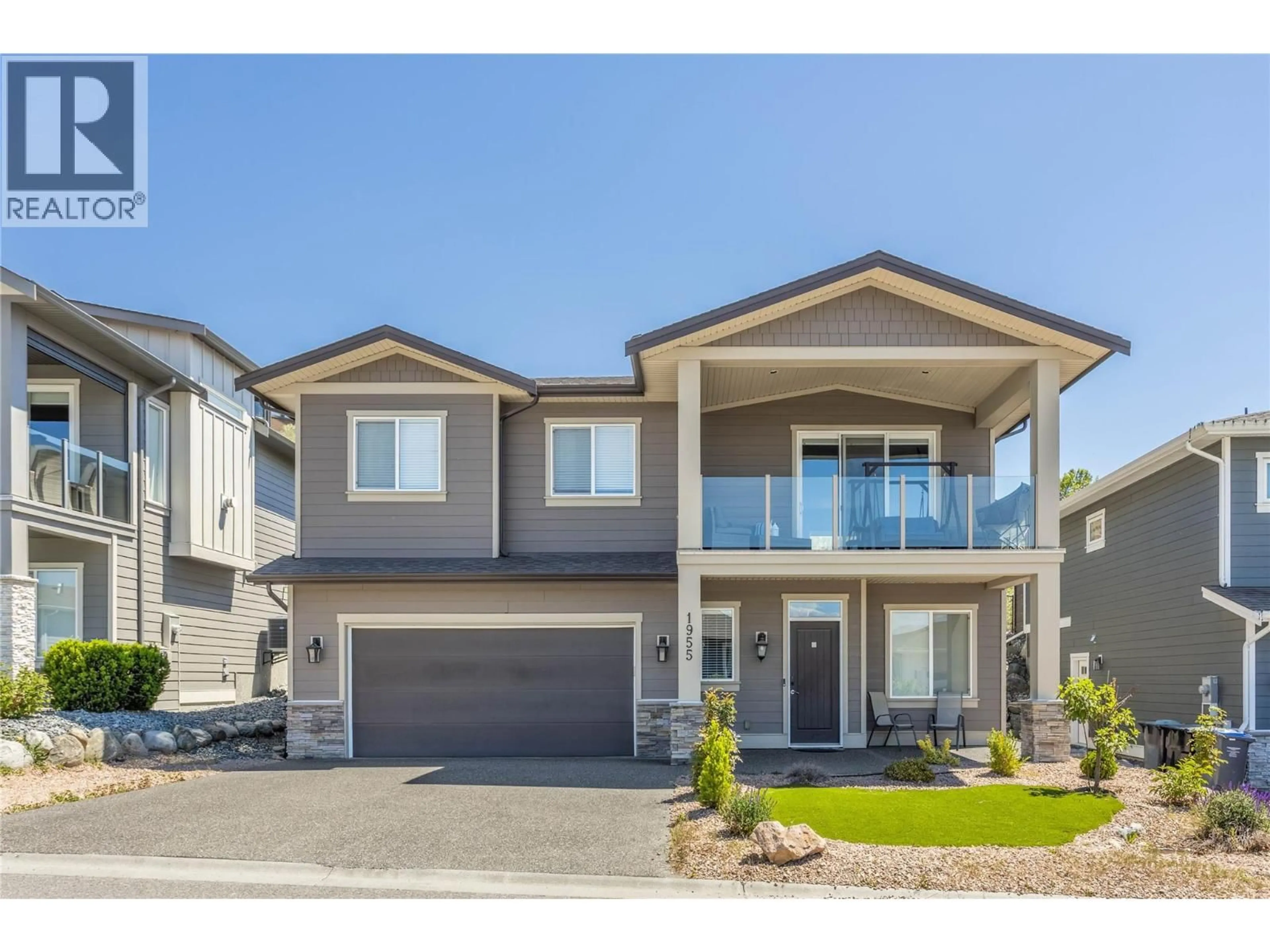 Home with vinyl exterior material, street for 1955 FOXTAIL TERRACE, Kelowna British Columbia V1P1T9