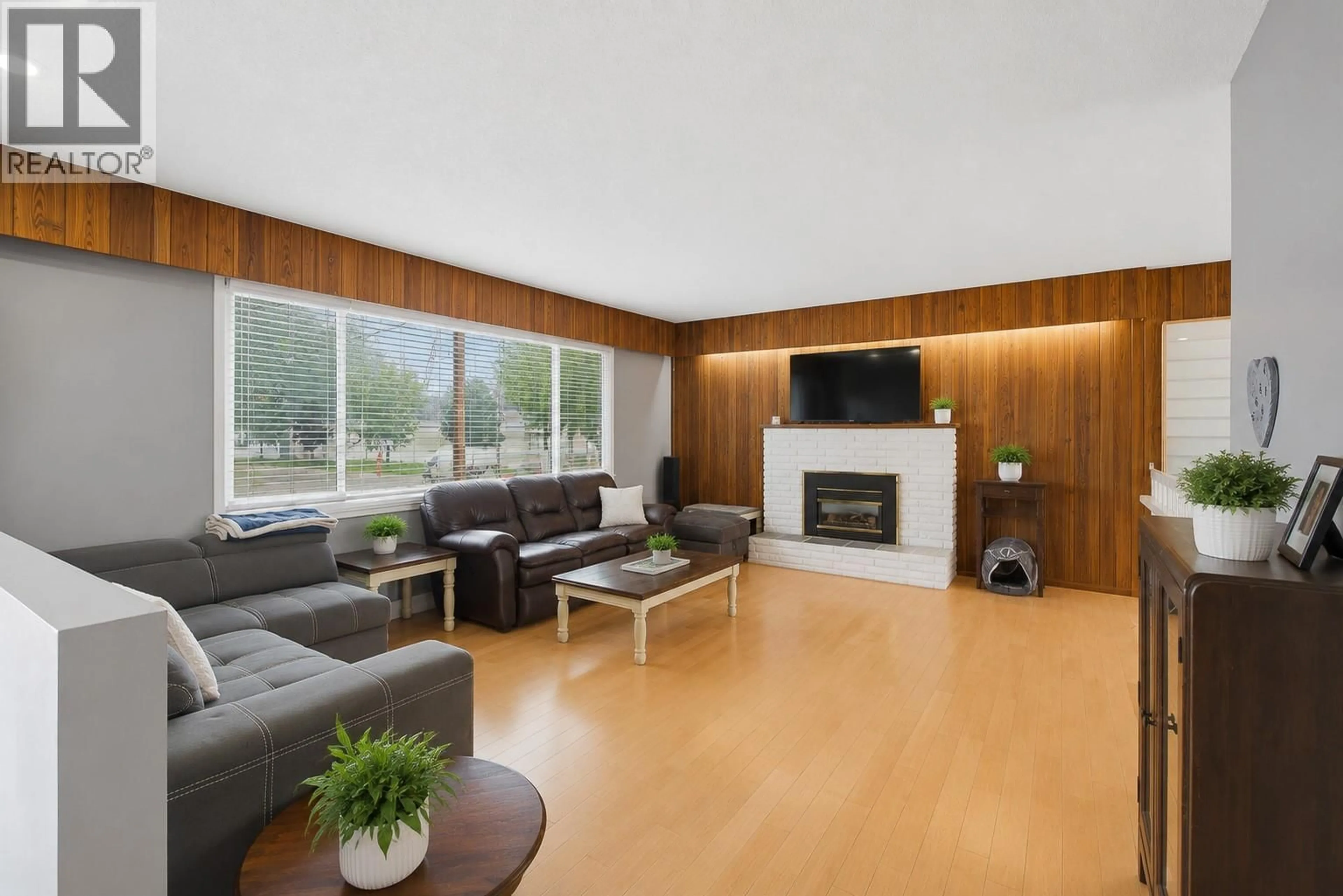 Living room with furniture, wood/laminate floor for 1801 HAMILTON AVENUE, Merritt British Columbia V1K1B8