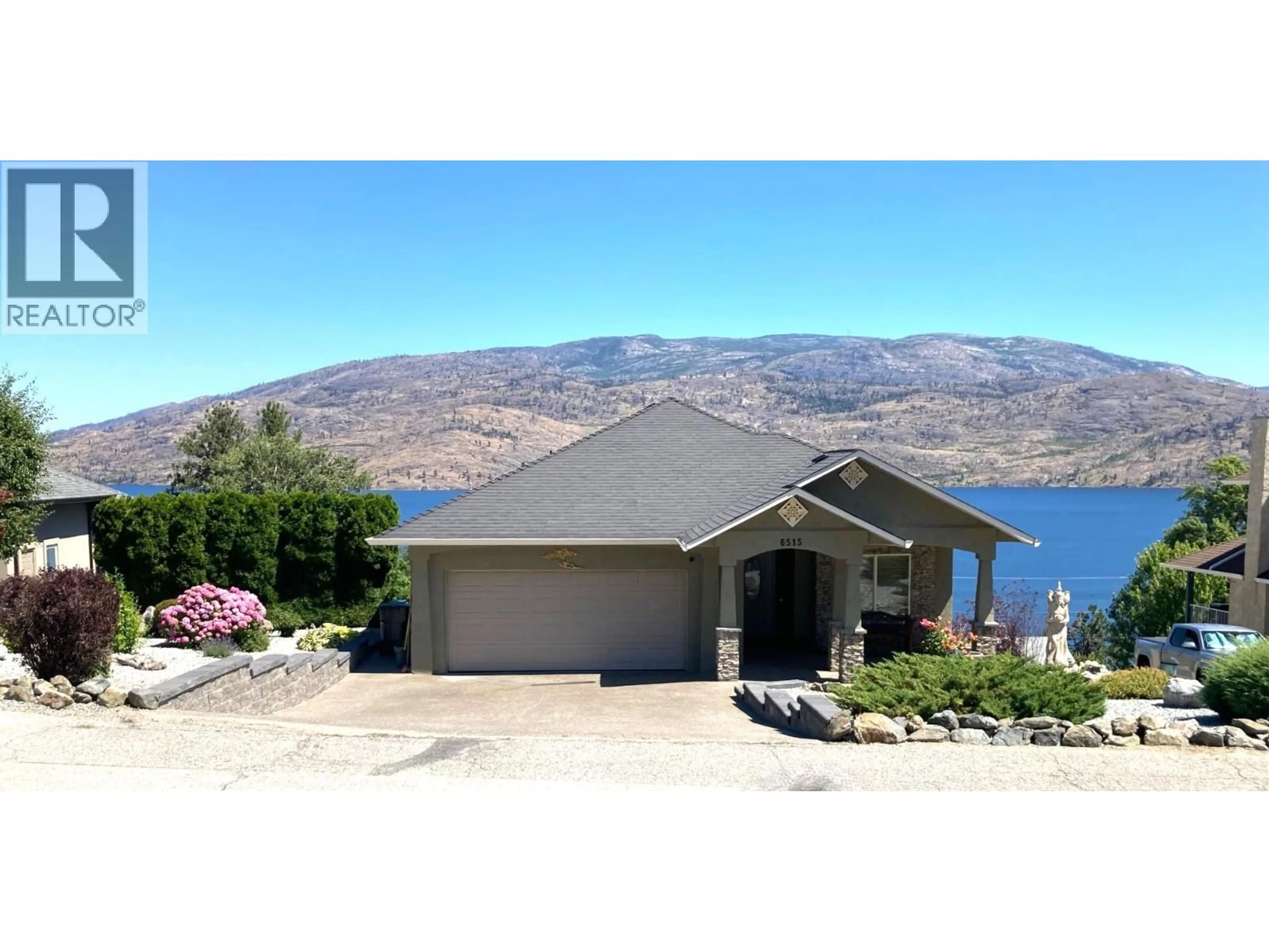 A pic from outside/outdoor area/front of a property/back of a property/a pic from drone, water/lake/river/ocean view for 6515 FERGUSON PLACE, Peachland British Columbia V0H1X7