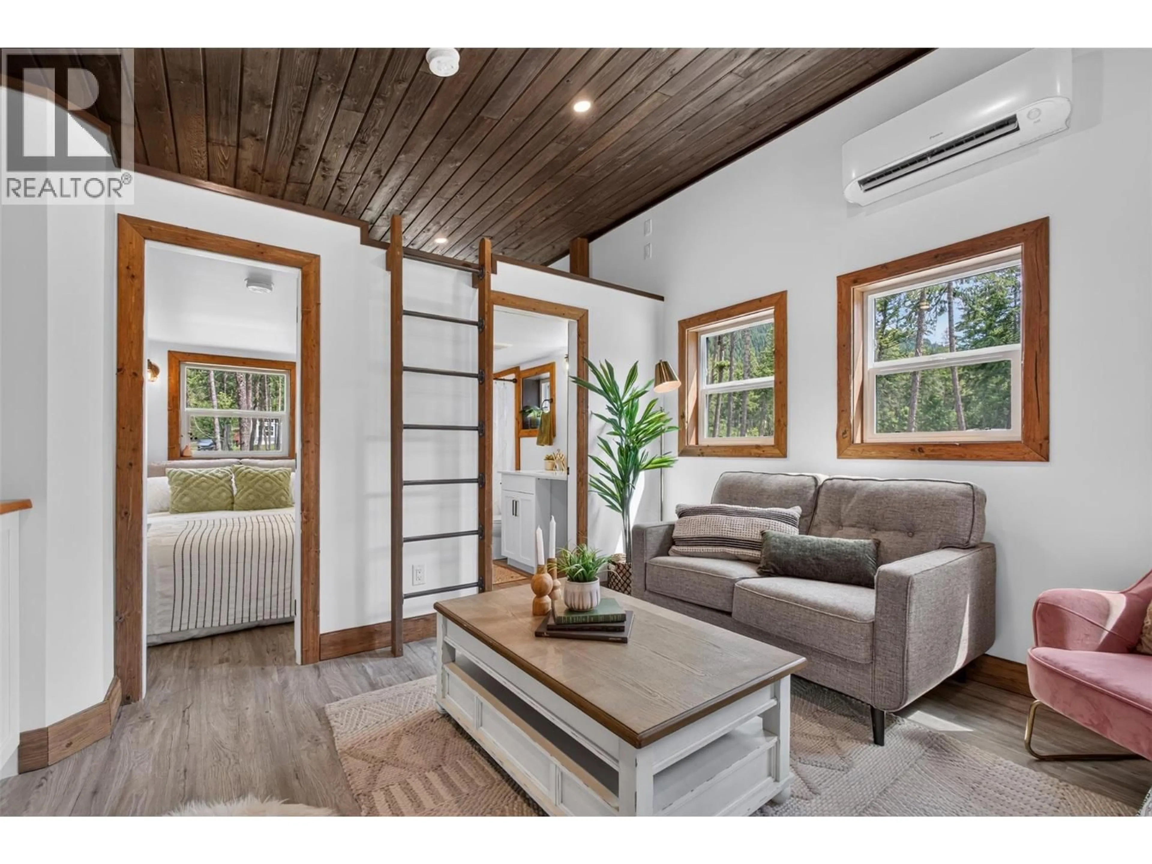 Living room with furniture, wood/laminate floor for 3 - 5533 33 HIGHWAY, Beaverdell British Columbia V0H1A0
