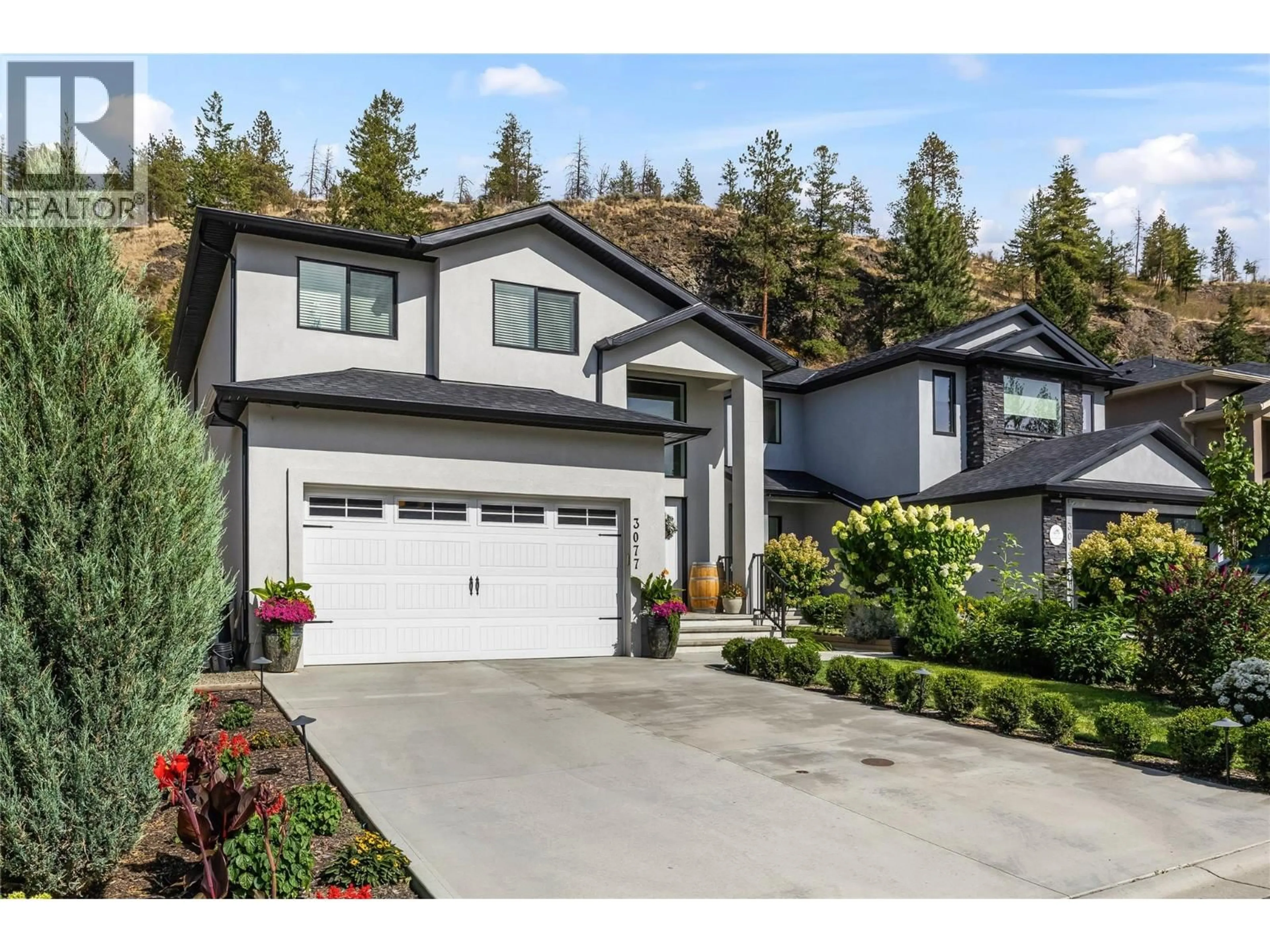 Home with vinyl exterior material, street for 3077 RIESLING WAY, West Kelowna British Columbia V4T0A5