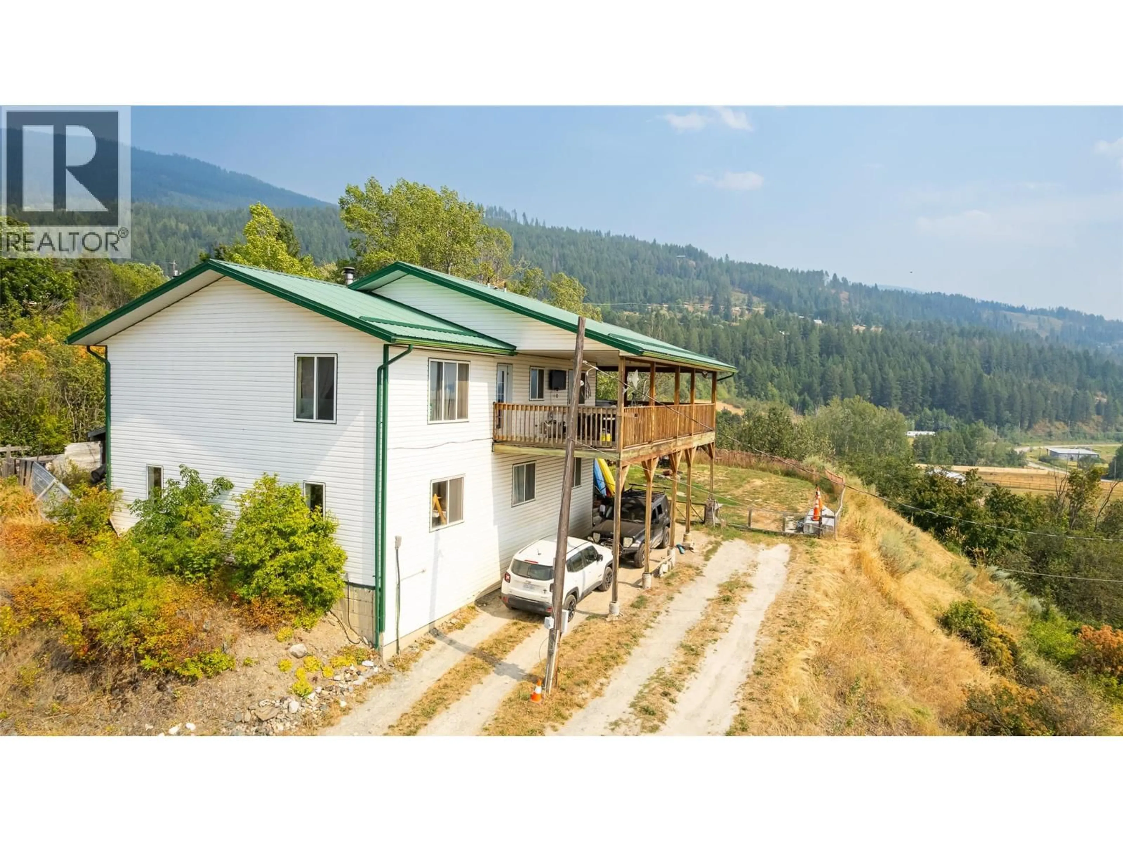 A pic from outside/outdoor area/front of a property/back of a property/a pic from drone, mountain view for 4840 LOWER WYNNDEL ROAD, Wynndel British Columbia V0B2N1
