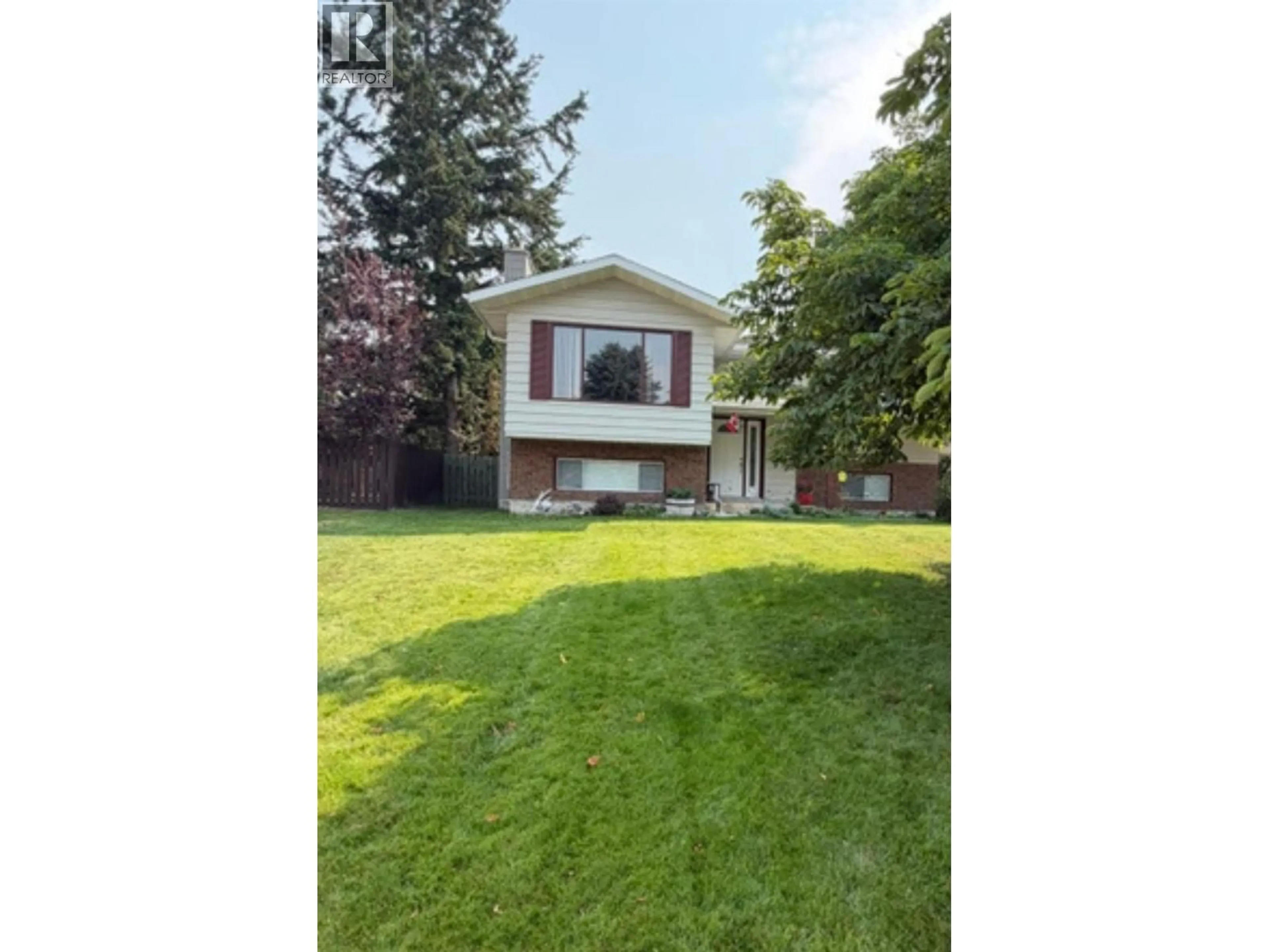 Home with vinyl exterior material, street for 1317 16TH STREET SOUTH, Cranbrook British Columbia V1C5K5